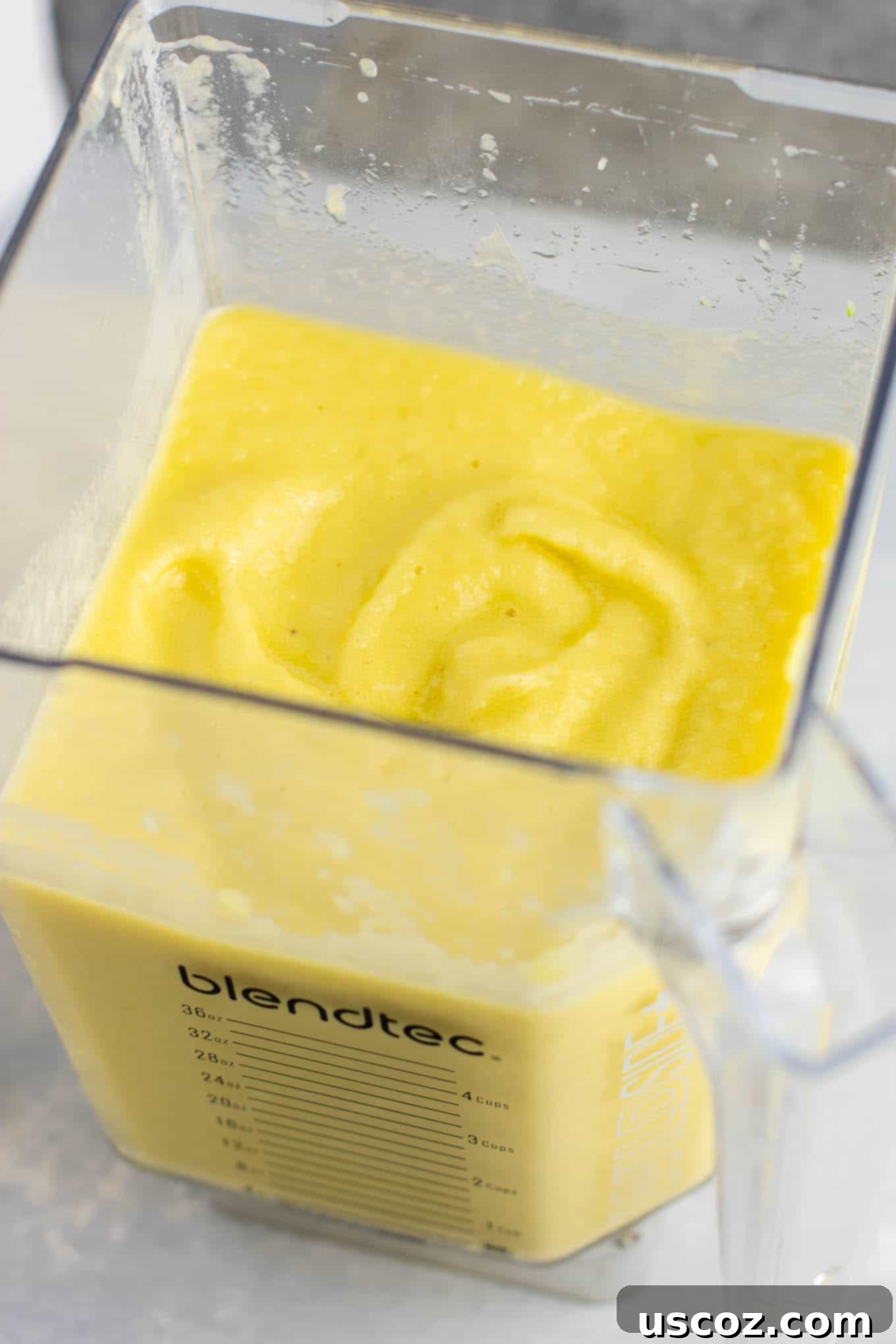 Pineapple detox smoothie with cucumbers, celery, lemon, peaches, ginger, and frozen bananas. A healthy smoothie recipe that tastes delicious! #detox #detoxsmoothie #healthysmoothie #vegan #healthyeating #healthyrecipe #smoothie #vegansmoothie