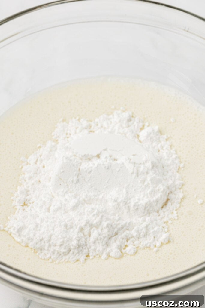 Pumpkin Cheesecake Dip 8 adding powdered sugar to heavy cream