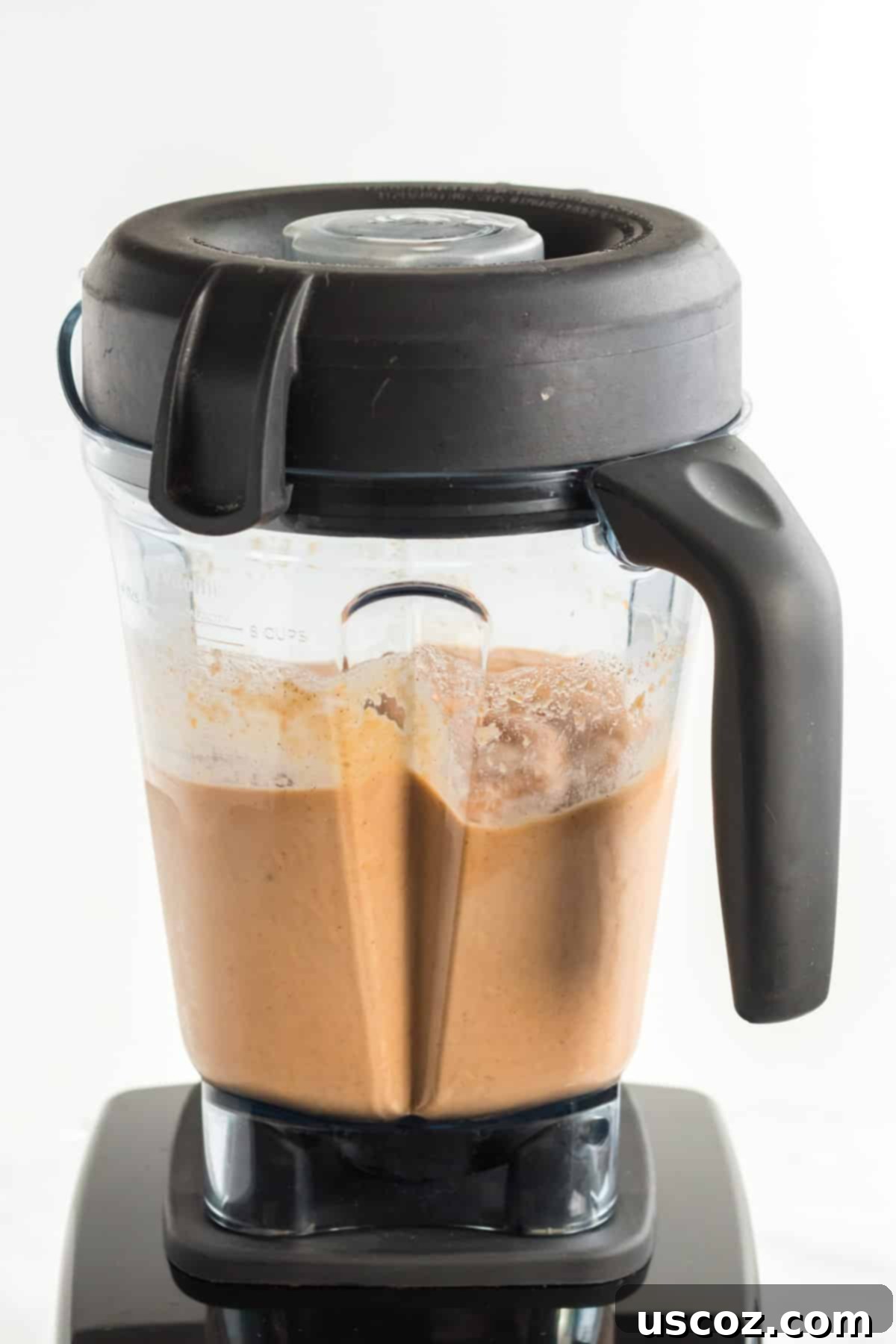 blender filled with sweet potato smoothie
