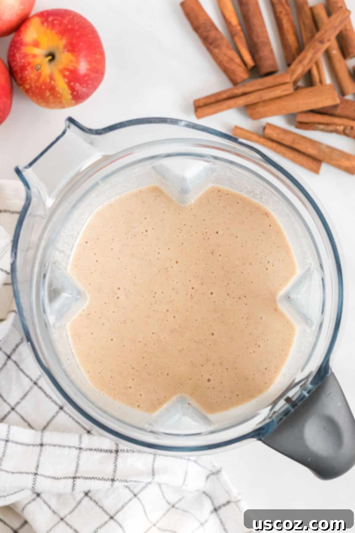 Liquid Apple Pie 6 Apple pie smoothie being blended in a high-speed blender until thick and creamy