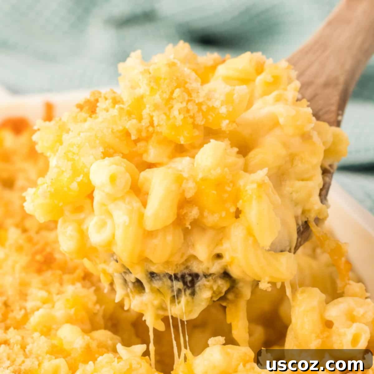 36 Delicious Vegetarian Thanksgiving Dishes 16 Scooping rich, baked macaroni and cheese from a casserole dish, showing the crunchy panko topping