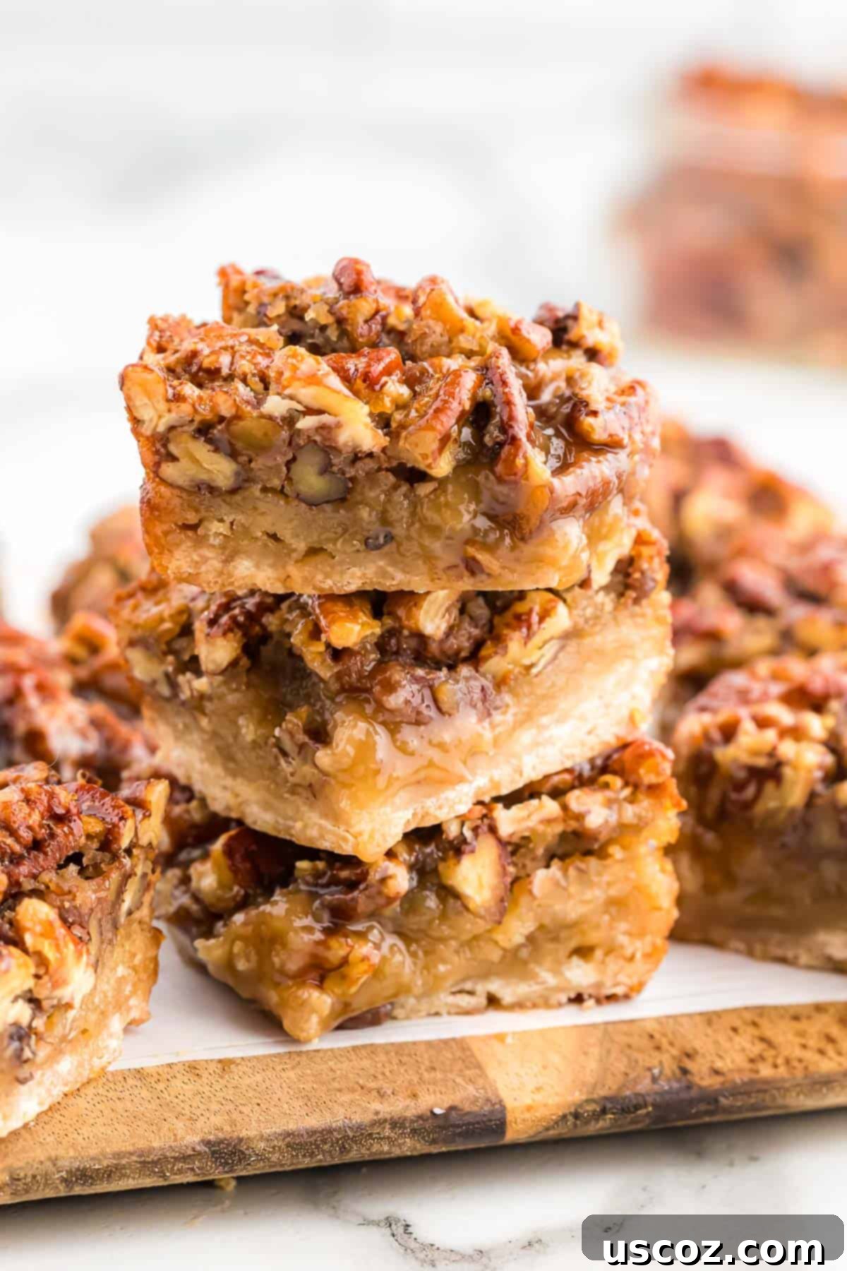 36 Delicious Vegetarian Thanksgiving Dishes 28 Stack of delicious pecan pie bars with a flaky shortbread crust