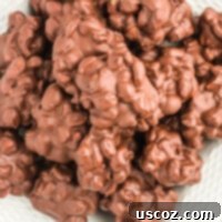 Delicious peanut clusters made easily in the crock pot, showcasing their rich, chocolatey goodness and crunchy peanuts.
