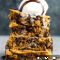 Gluten free cookie bars that are secretly healthy but taste incredibly decadent. They taste like a fancy restaurant dessert! These are dairy-free and healthy gluten-free cookie bars.