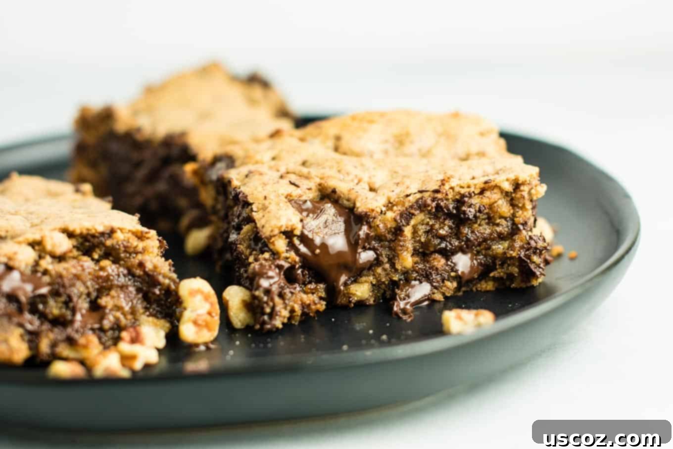 My Plant-Based Thanksgiving Celebration 11 vegetarian thanksgiving menu - Dark Chocolate Pecan Cookie Bars recipe – gluten free and dairy free. You won’t believe how good these are! Serve warm with a scoop of vanilla ice cream! #glutenfree #dairyfree #cookiebars #dessert #chocolate