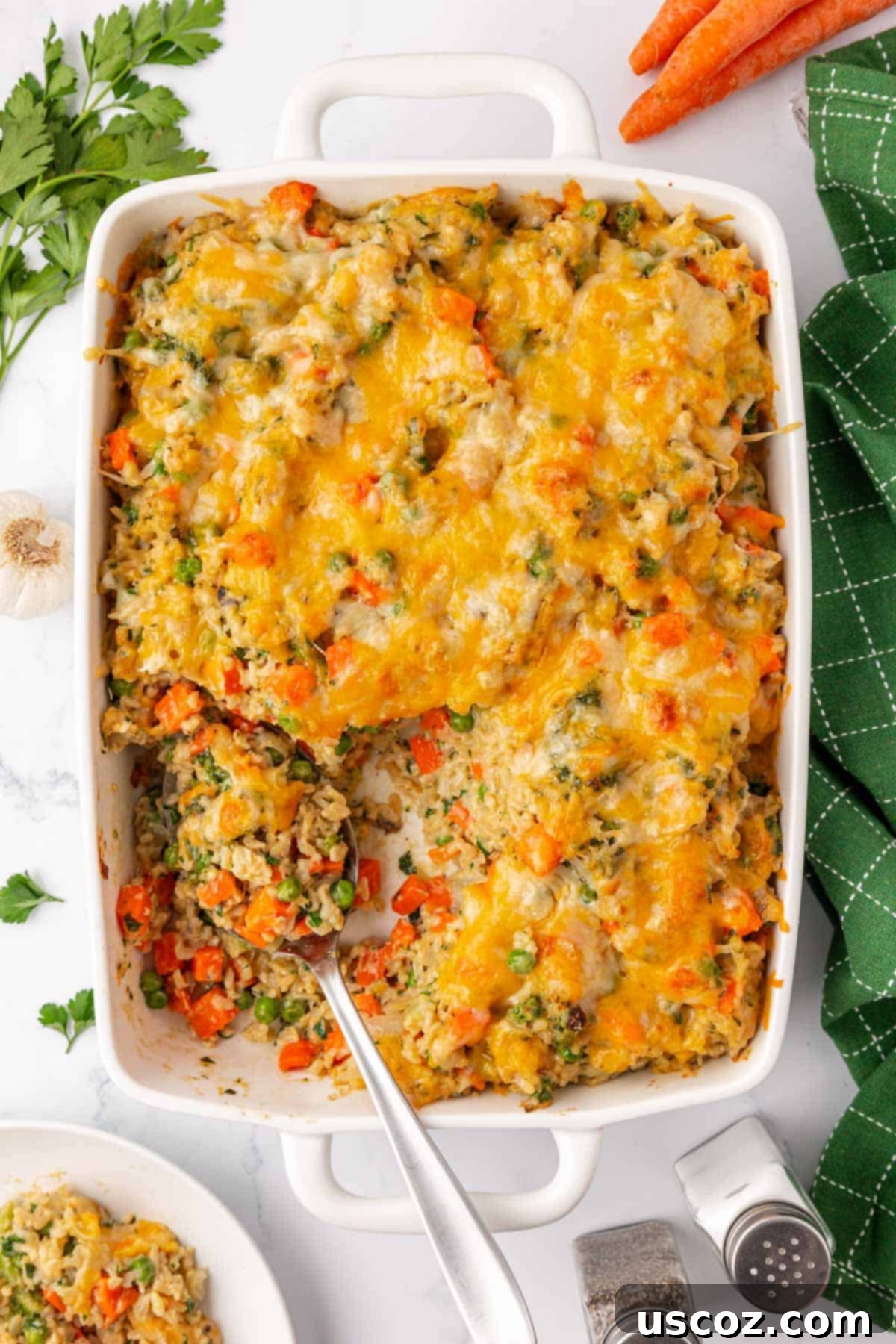 Hearty Veggie Rice Bake 15 Baked vegetable rice casserole with golden, bubbly cheese topping