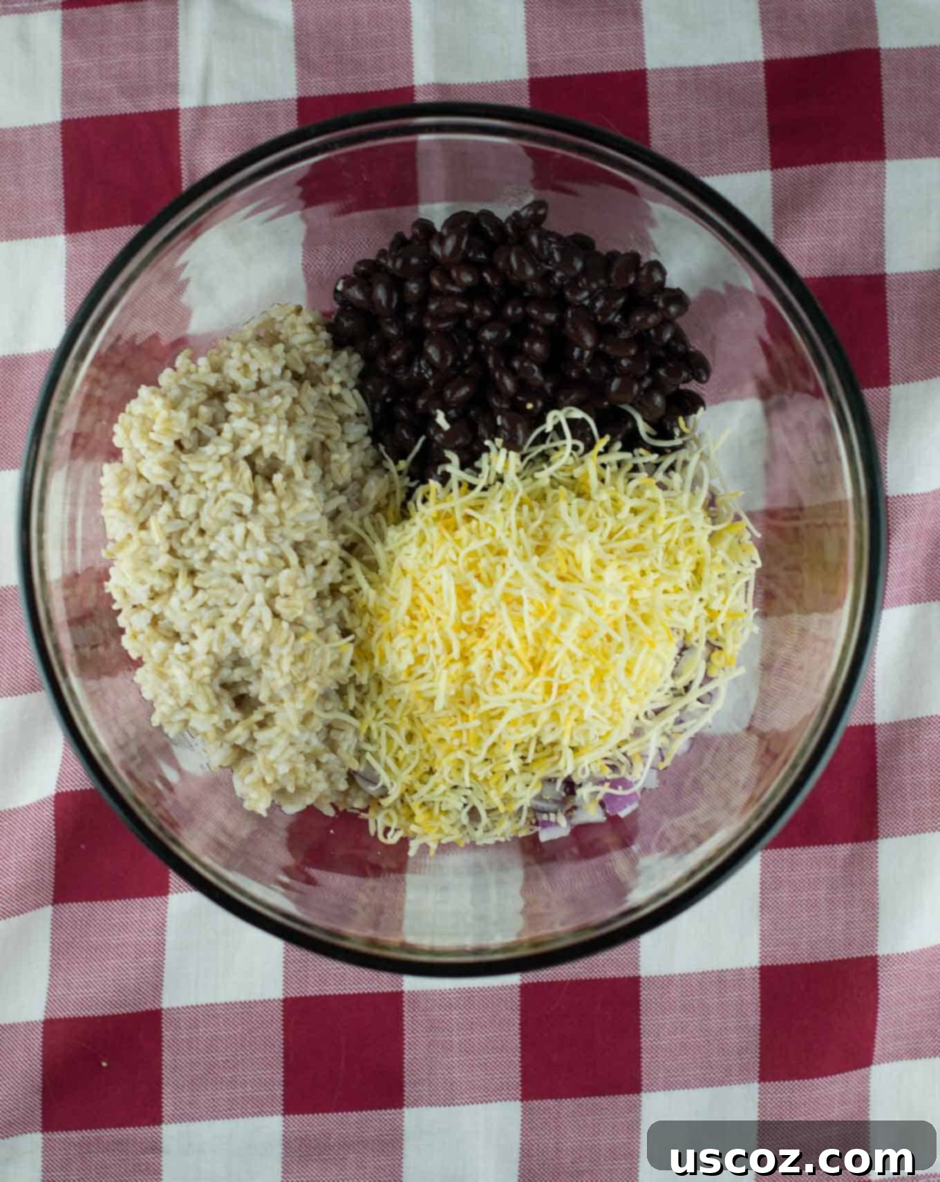 Bowl of fluffy cooked brown rice, a key component for the stuffed pepper filling
