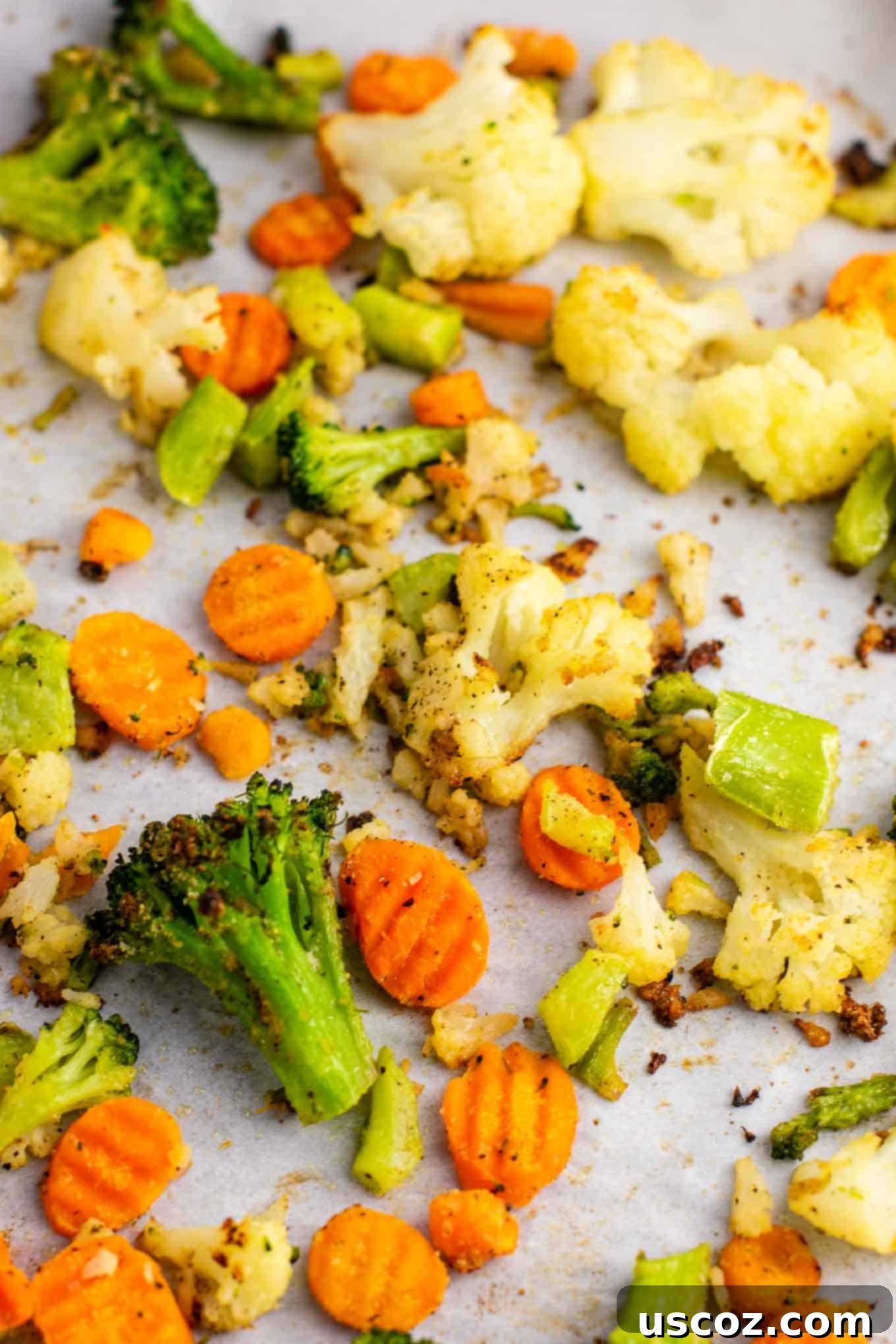 Easy Roasted Frozen Vegetables 6 roasted frozen veggies on the baking sheet after cooking