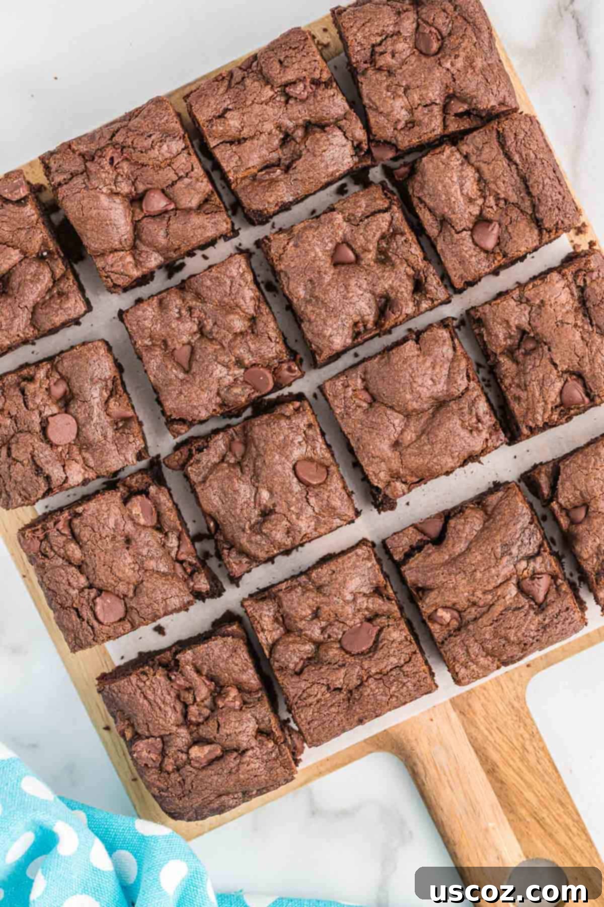 Easy Cake Mix Brownies 11 Beautifully cut cake mix brownies arranged in neat squares on a cooling rack.