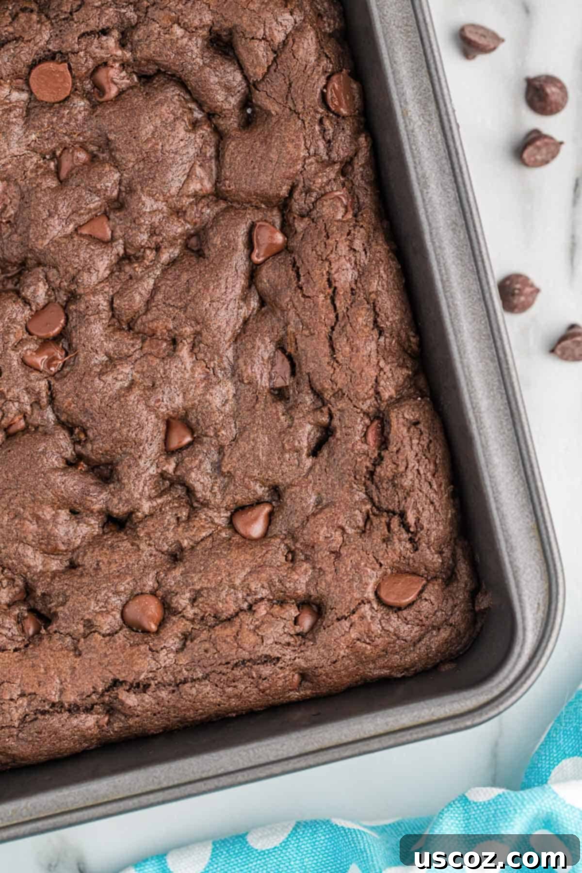 Easy Cake Mix Brownies 5 Cake mix brownie batter spread evenly in a square baking pan before baking.