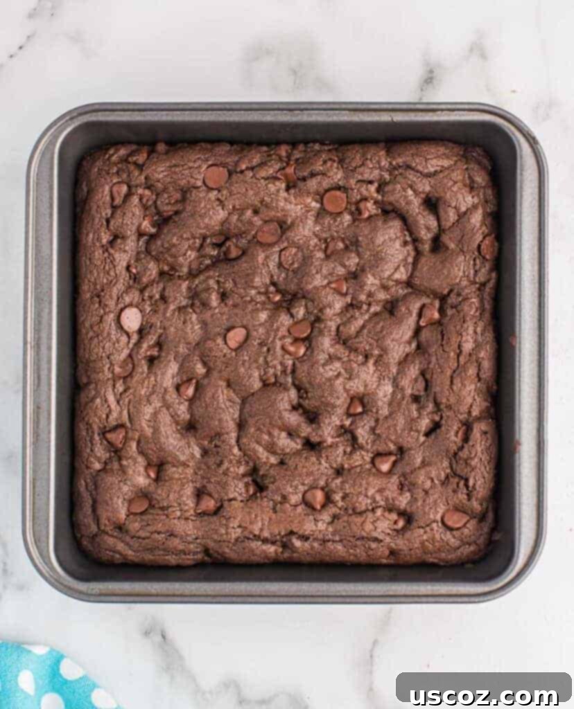 Easy Cake Mix Brownies 10 The cake mix brownies baking in the pan, showing their rising and setting texture.