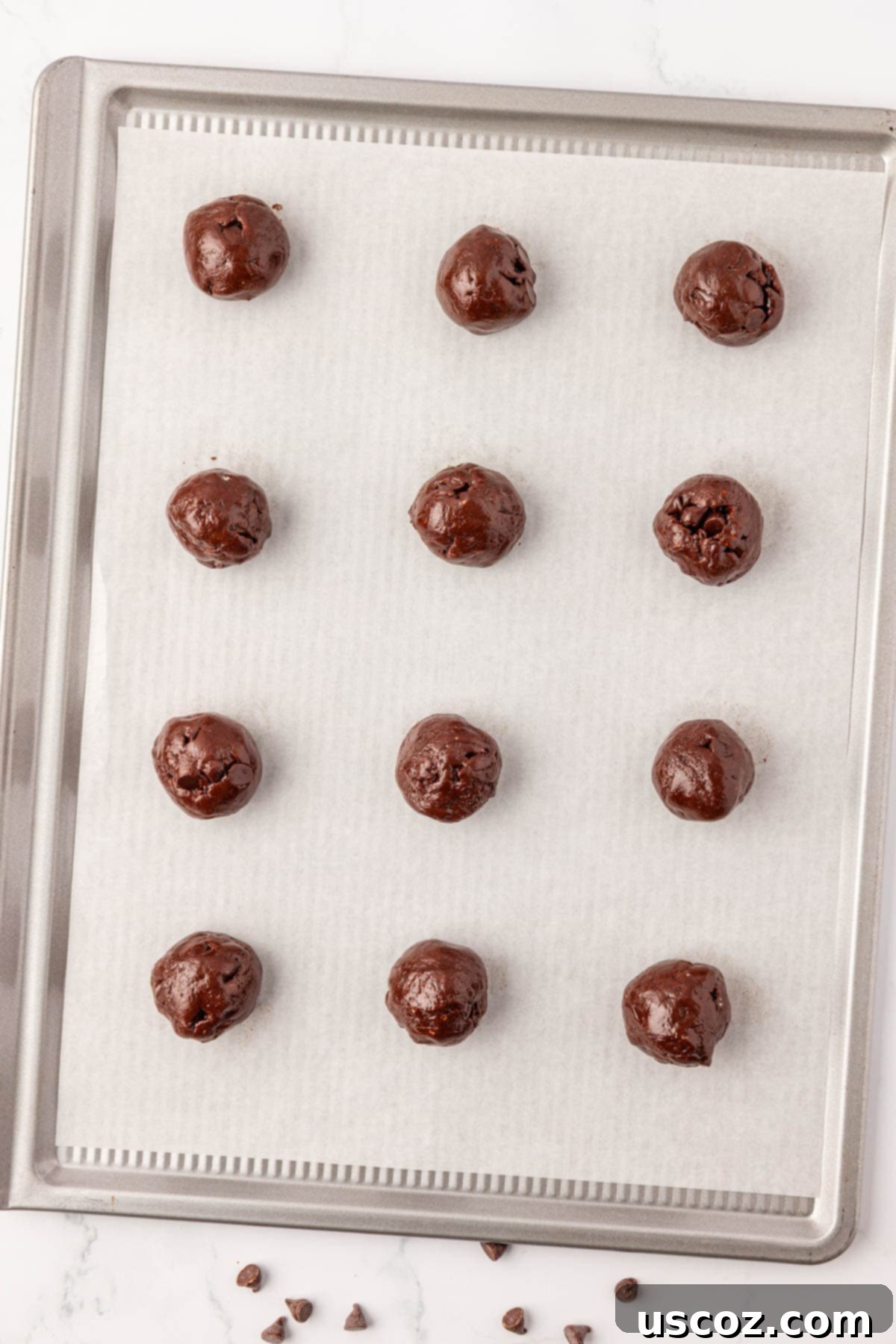 Decadent Chocolate Cake Mix Cookies 10 cookie dough rolled into neat balls and arranged on a baking sheet