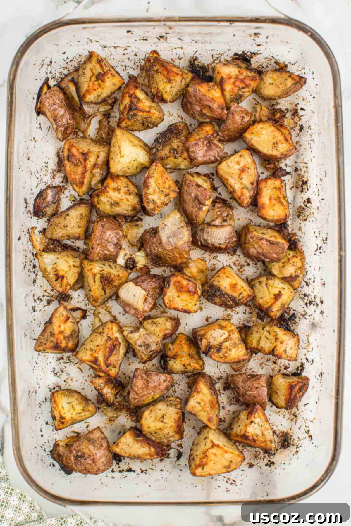 Caramelized Onion and Potato Medley 11 Roasted potatoes and onions, glistening and perfectly browned, in a white baking dish.