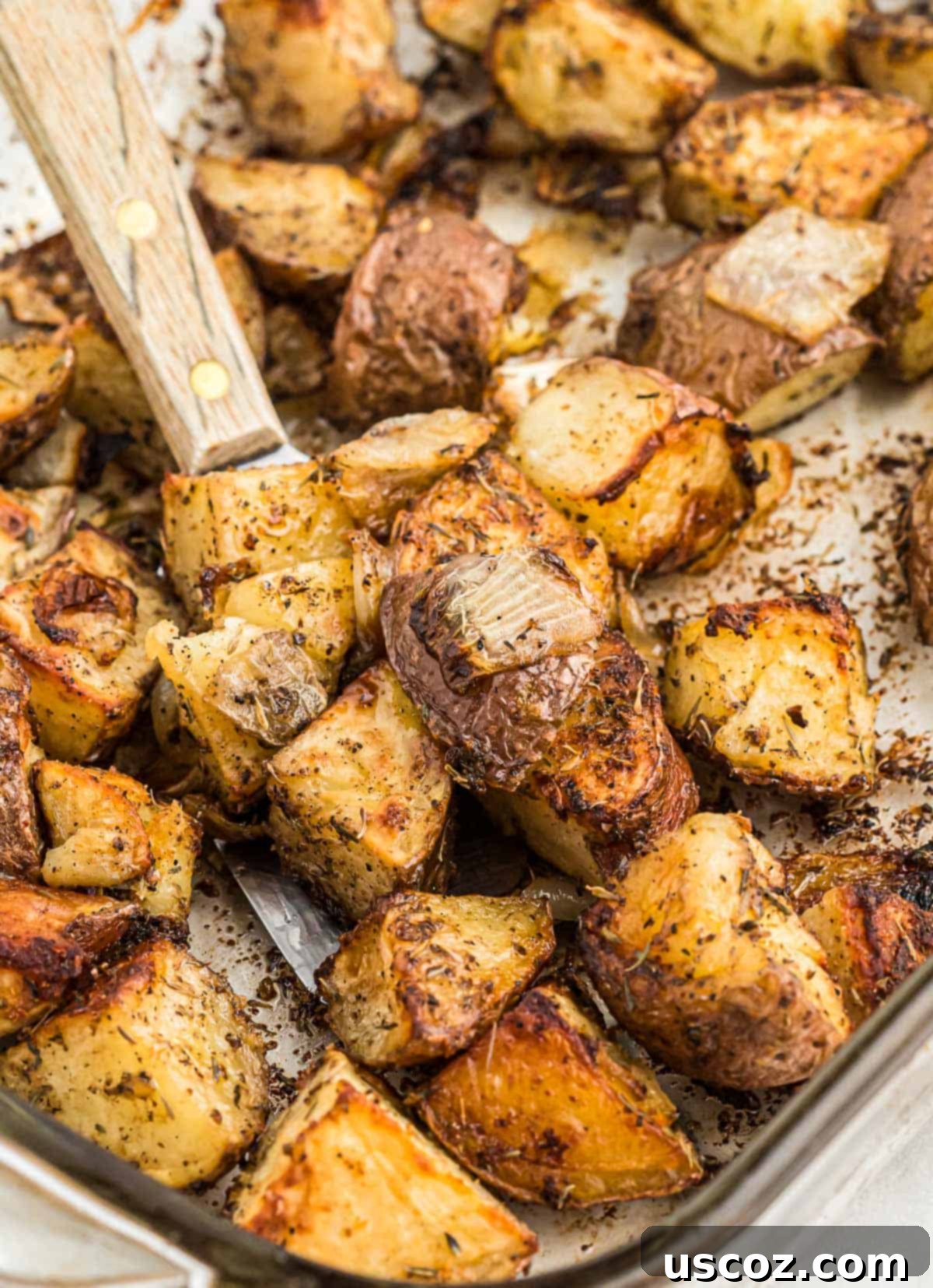 Caramelized Onion and Potato Medley 12 A serving of easy roasted potatoes with onions, ready to be enjoyed.