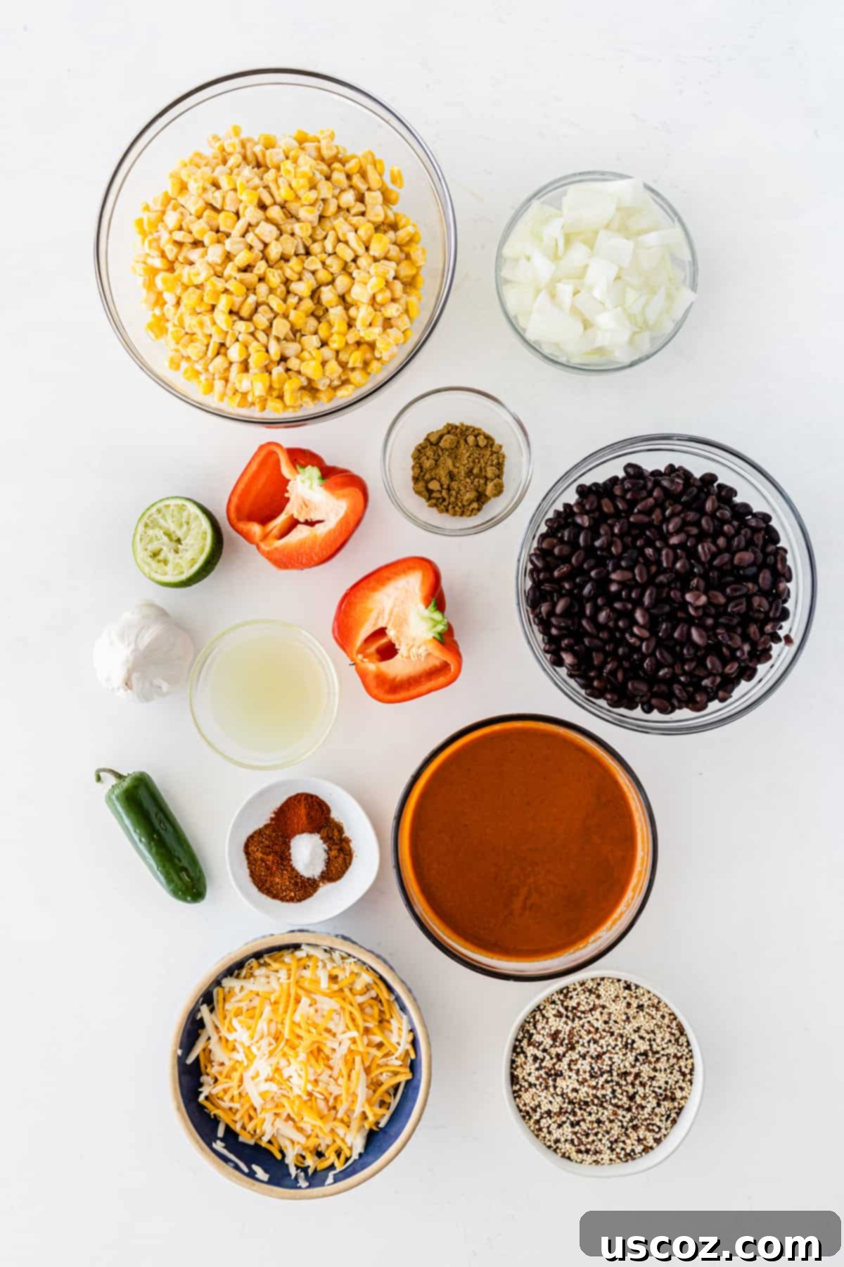 Wholesome Quinoa Enchilada Bake 4 A neat arrangement of all the fresh, colorful ingredients for the quinoa enchilada casserole laid out on a clean white board, ready for preparation.