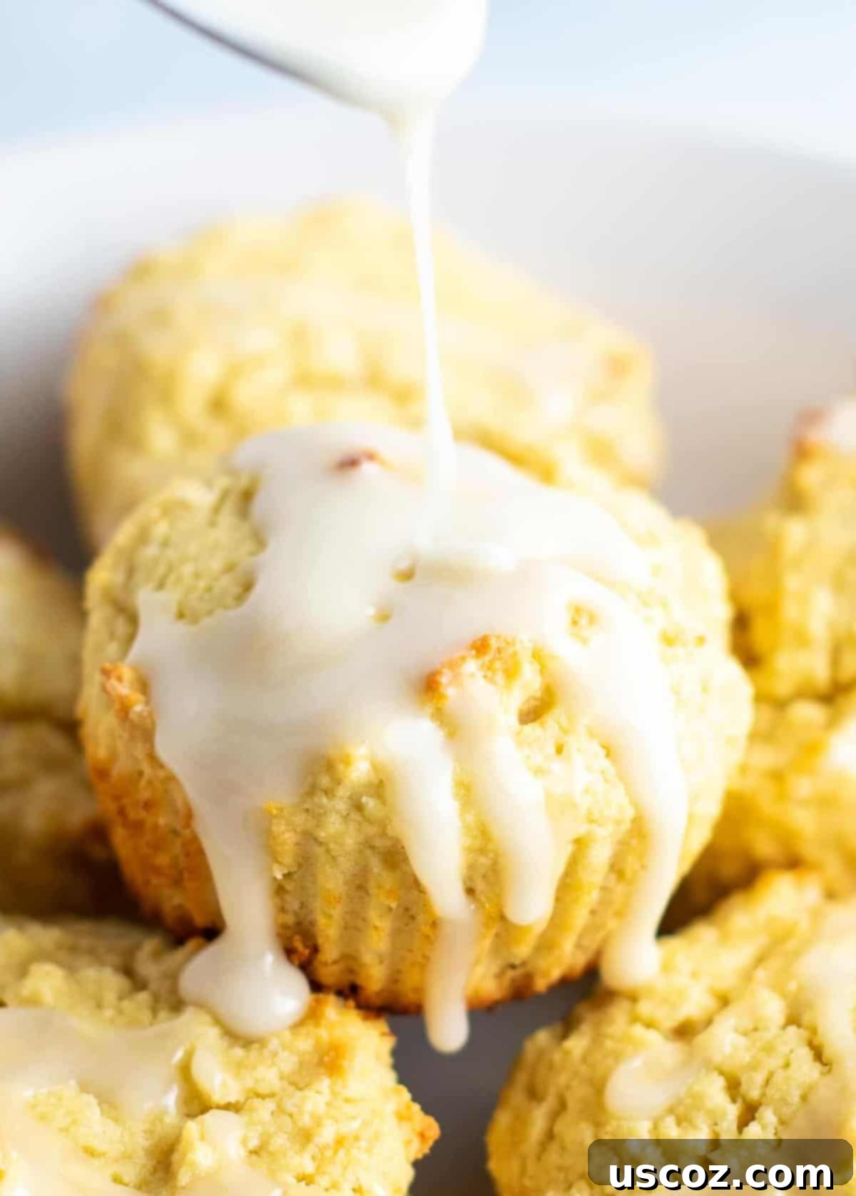 Zesty Gluten Free Lemon Muffins 2 Close-up of fluffy gluten-free lemon muffins with a sweet lemon glaze, ready for breakfast or a snack. #glutenfree #lemonmuffins #breakfast