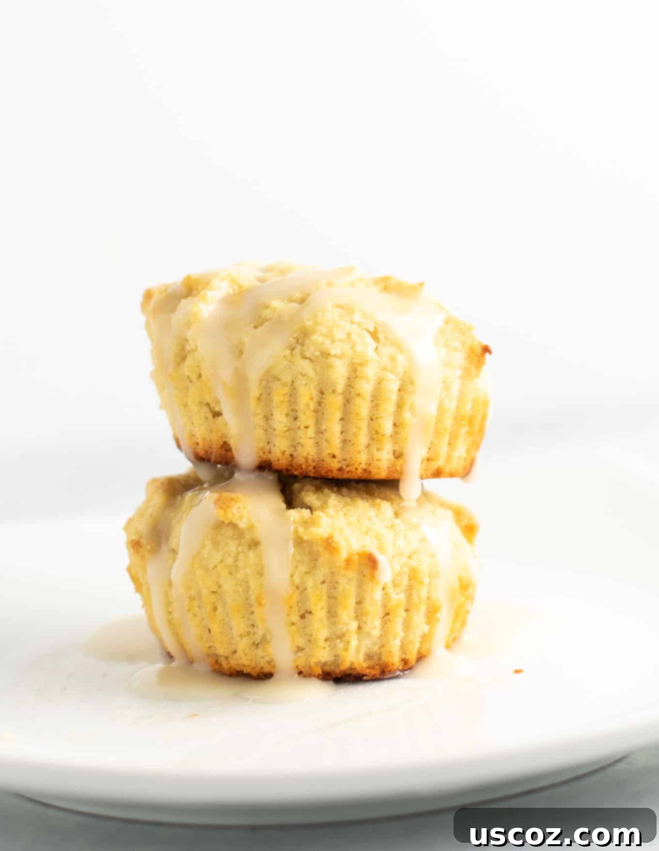 Zesty Gluten Free Lemon Muffins 5 Freshly baked gluten-free lemon muffins cooling in a muffin tin, ready for the sweet lemon glaze. #glutenfree #lemonmuffins #breakfast