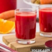Ruby Root Refresher 14 A glass of vibrant beet and carrot juice