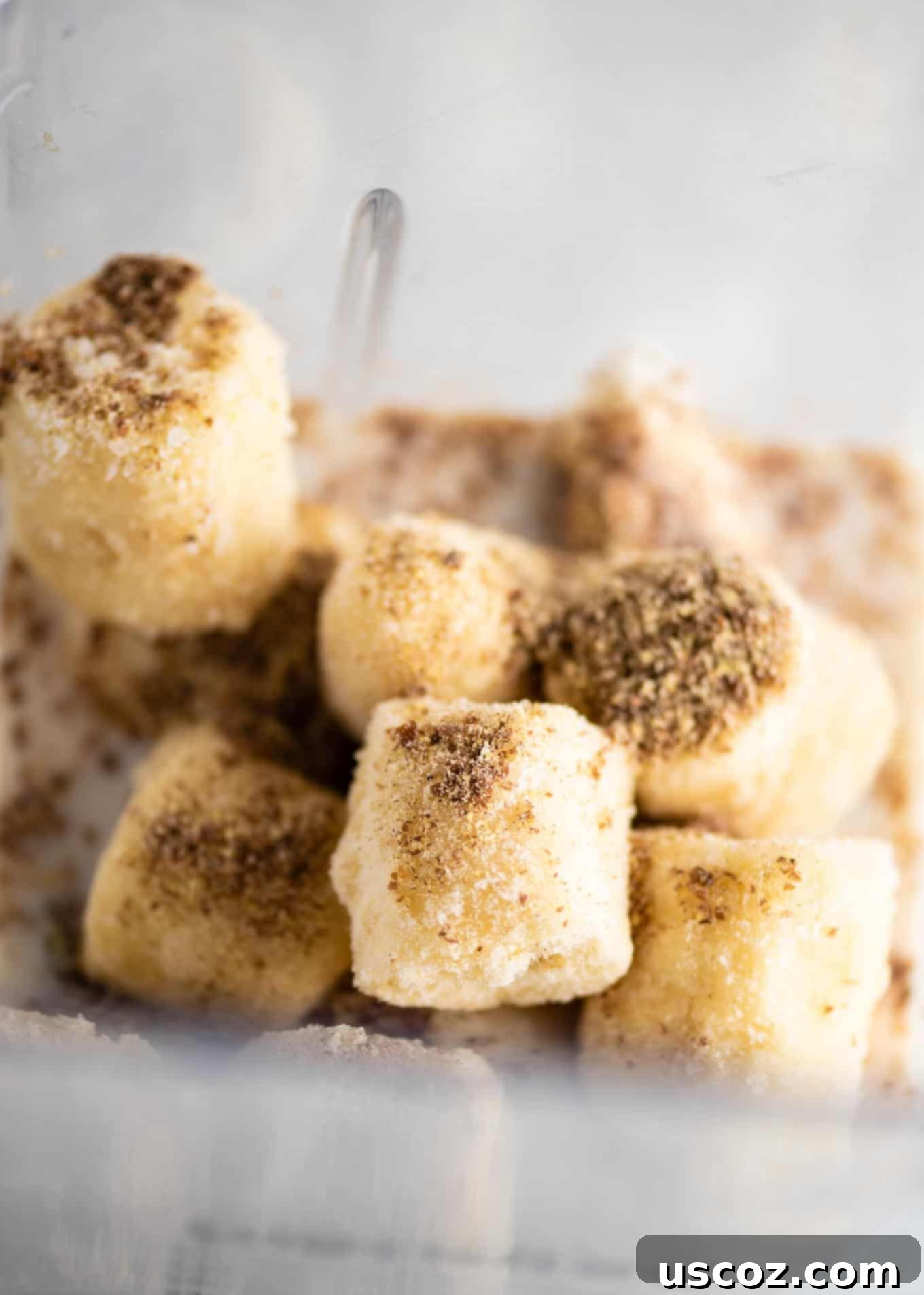 Creamy Banana Delight 3 Close-up shot of frozen banana chunks and ground flax seeds in a blender, ready for blending.