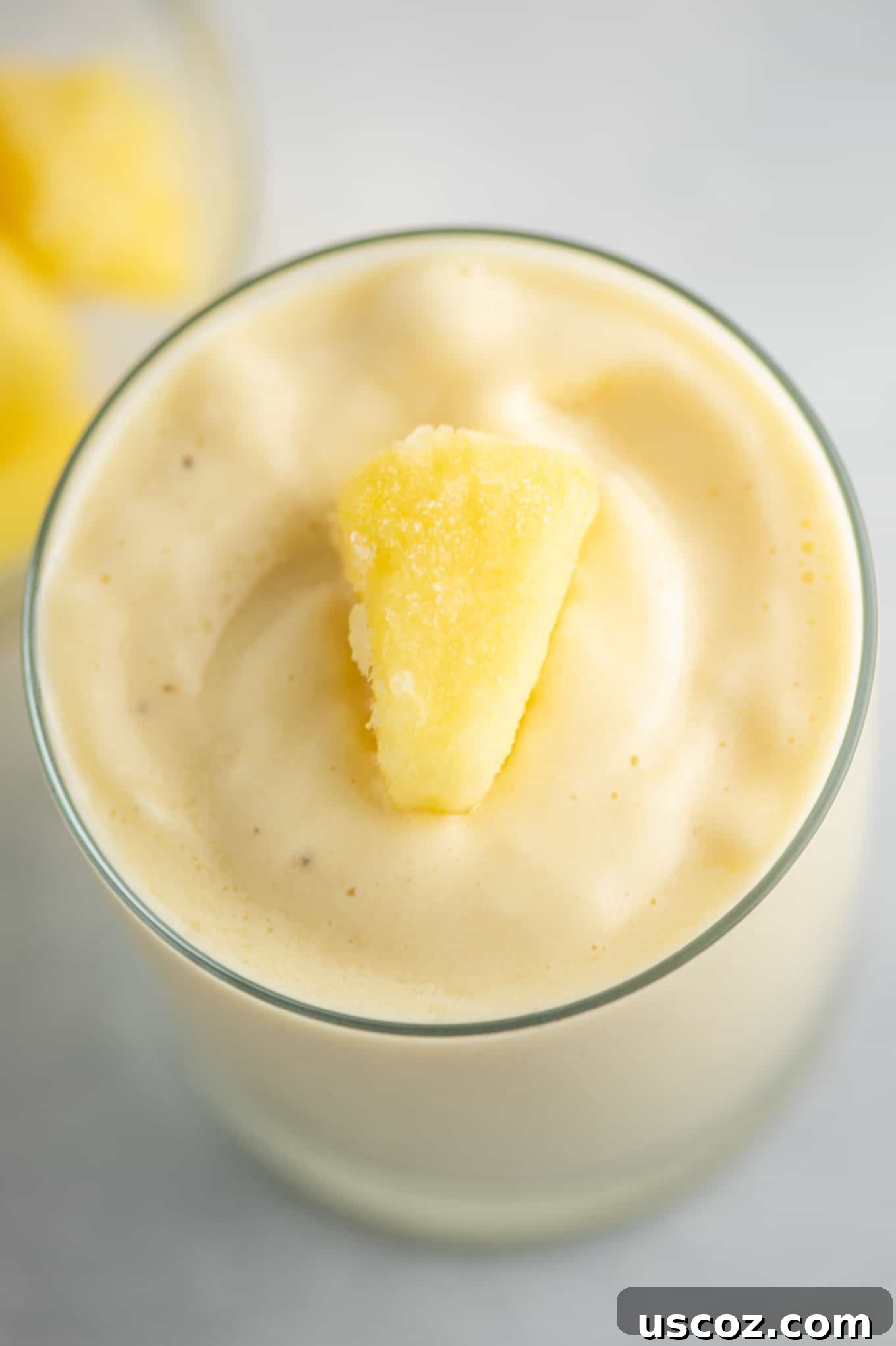 Tropical Pineapple Chill 3 frozen pineapple on top of the pineapple smoothie