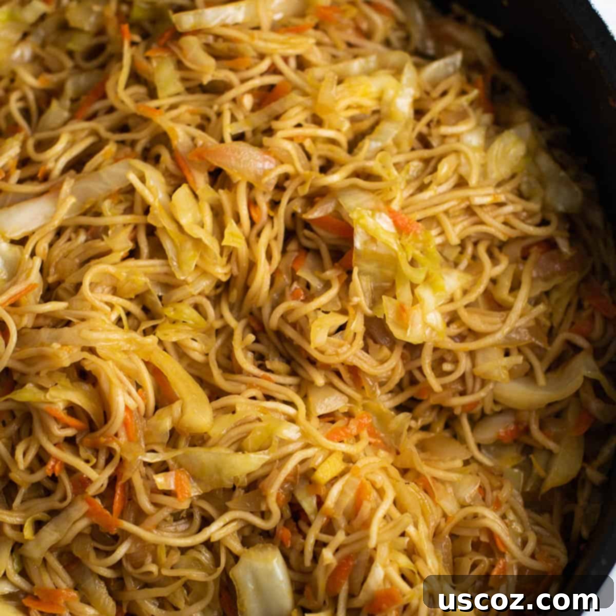 Savory Cabbage Stir Fry 15 cabbage stir fry in a serving bowl with chopsticks