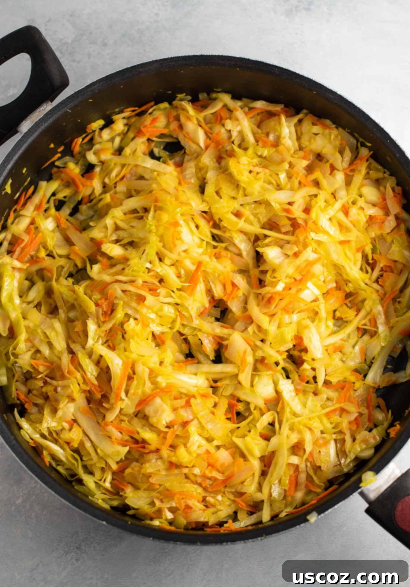 Savory Cabbage Stir Fry 8 cooked cabbage, carrots, ginger, and onion, showing the wilted texture