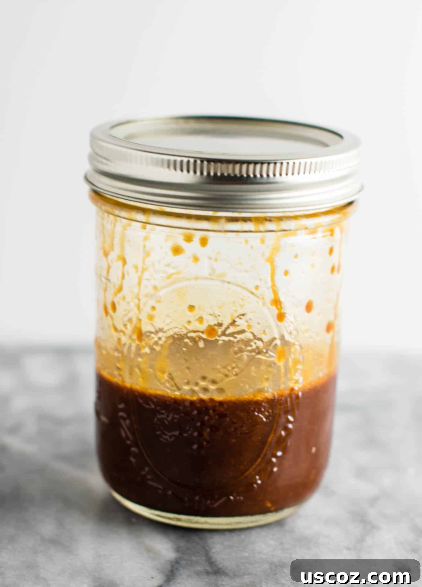 Savory Cabbage Stir Fry 9 stir fry sauce in a mason jar with a lid, ready to be used