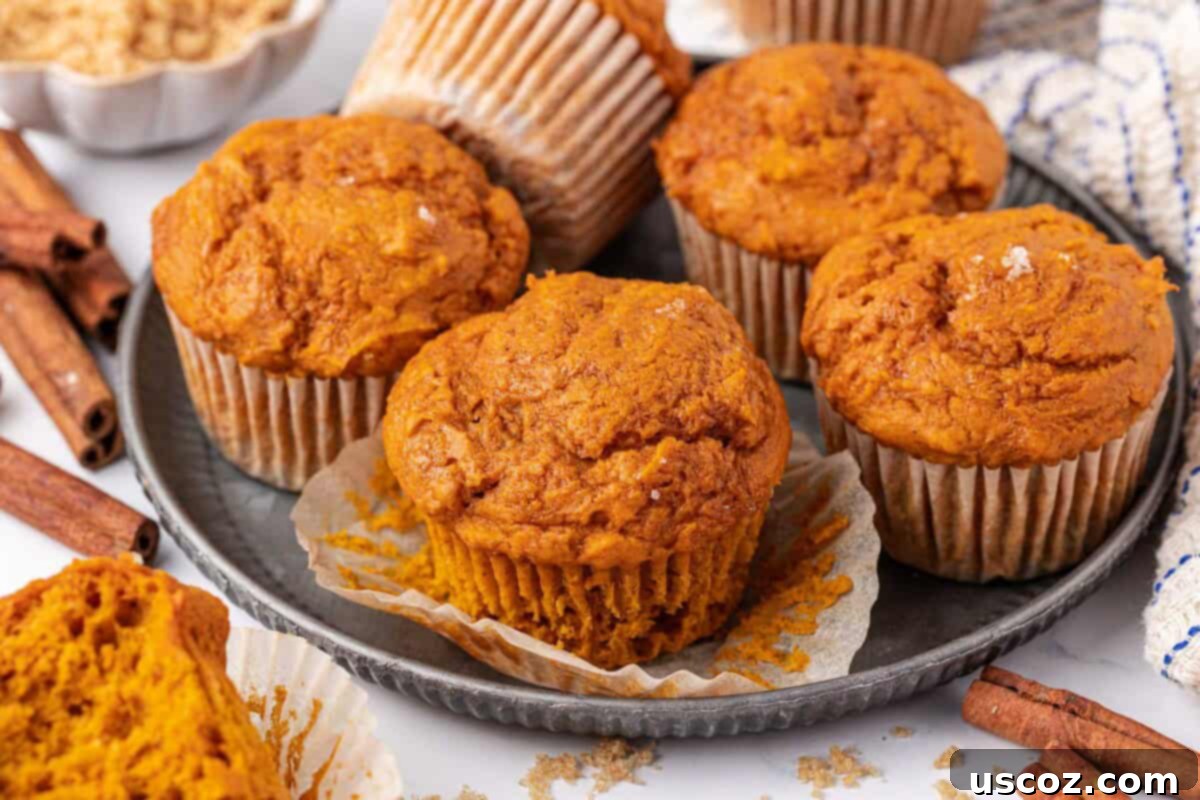 Effortless Cake Mix Pumpkin Muffins 11 a cluster of warm cake mix pumpkin muffins fresh from the oven