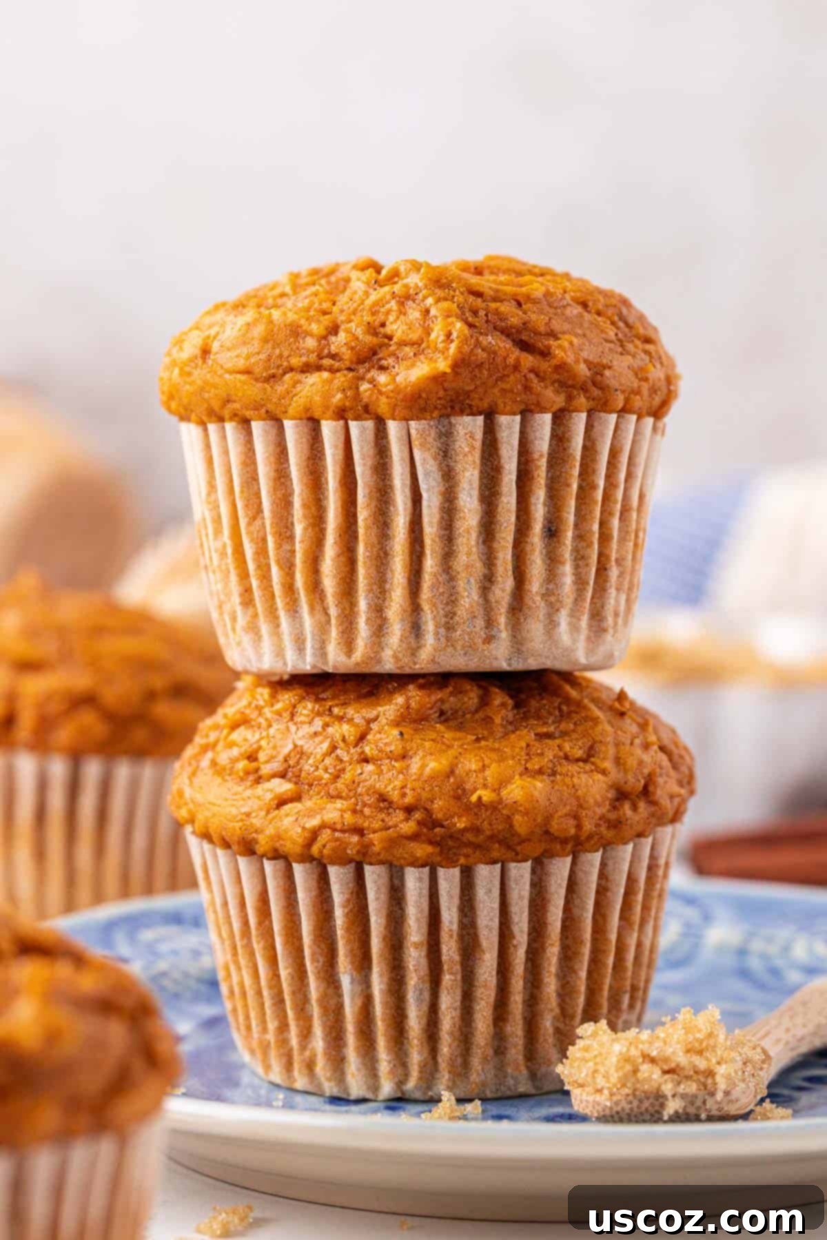 Effortless Cake Mix Pumpkin Muffins 13 stack of cake mix pumpkin muffins on a plate