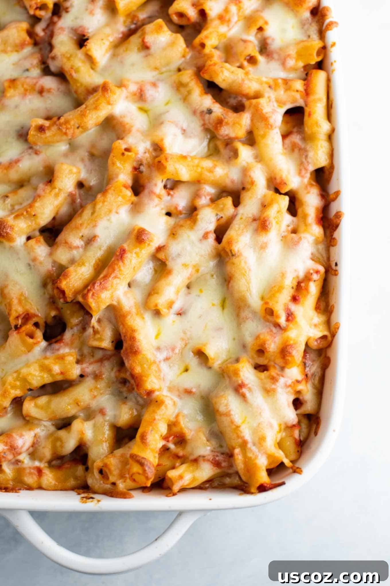 Ultimate Triple Cheese Baked Ziti 5 overhead shot of the baked ziti in the casserole dish, beautifully layered and ready to be baked