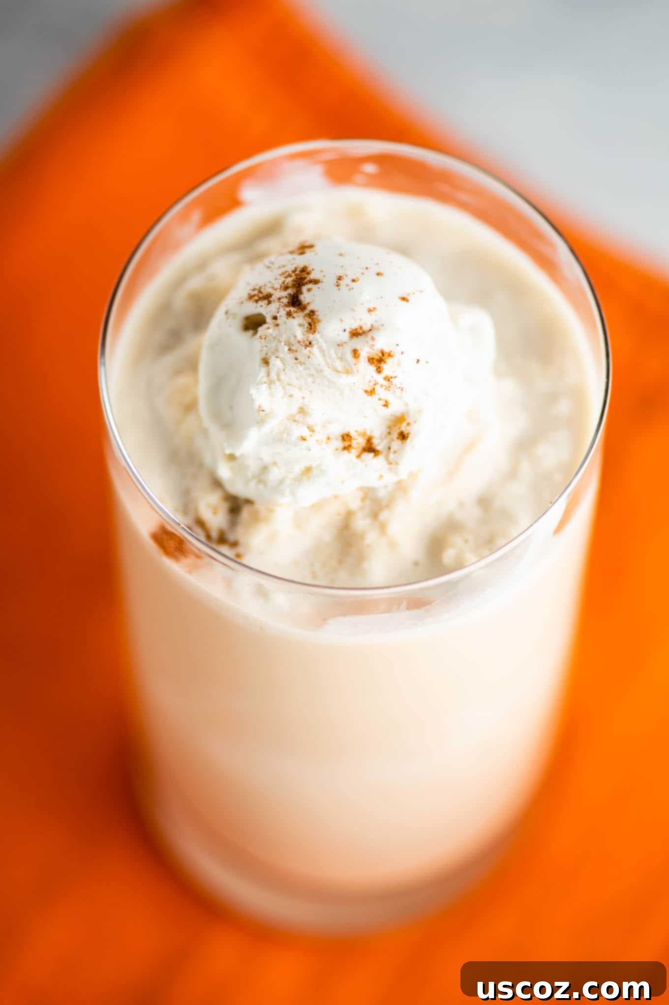 Pumpkin Spice Frost 3 pumpkin coffee drink sitting on an orange napkin