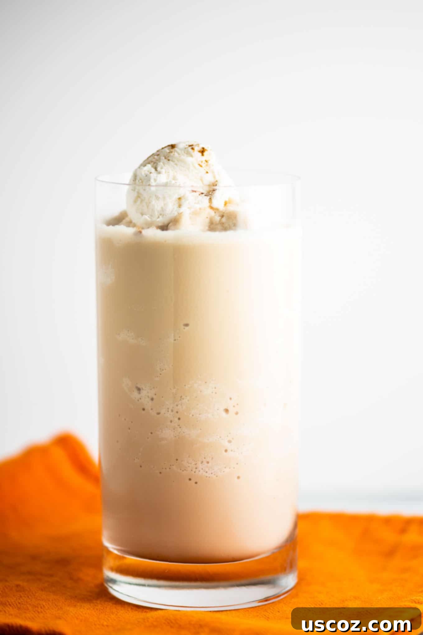 Pumpkin Spice Frost 5 pumpkin spice frozen coffee in a clear tall glass
