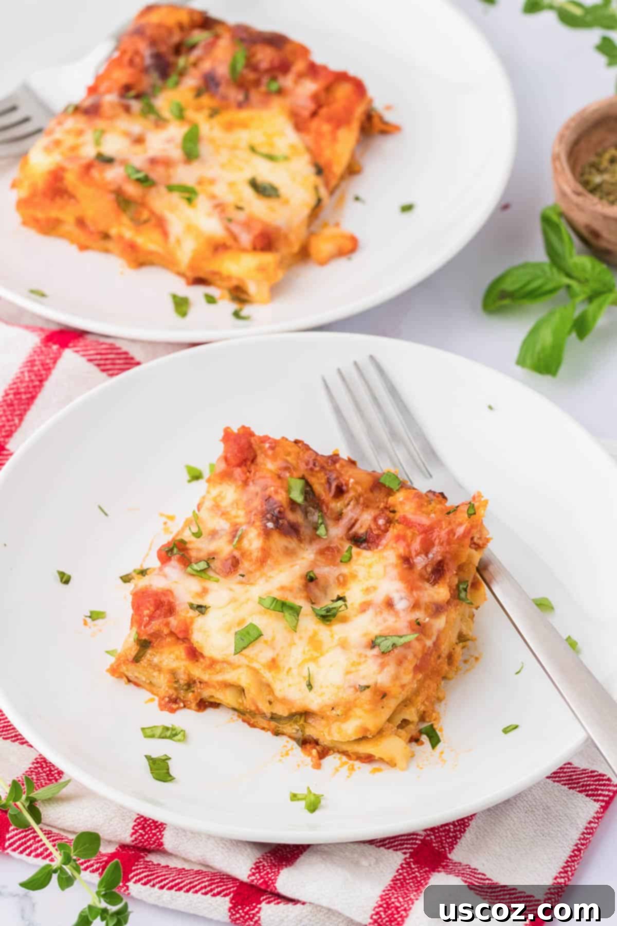 Classic Cheese Lasagna 27 A top-down view of a freshly baked cheese lasagna in a glass dish, showing a perfectly golden-brown, bubbly cheese topping and neatly cut edges.