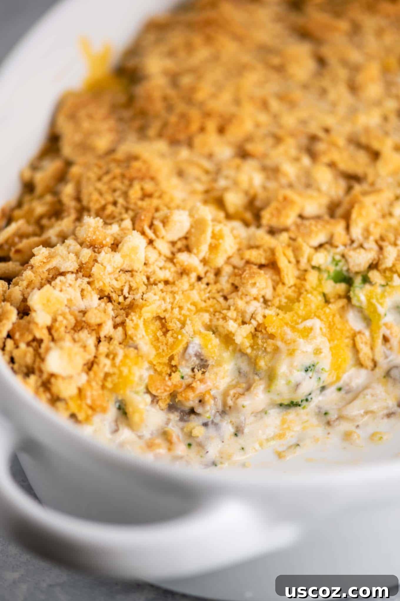 Crispy Ritz Broccoli Bake 17 ritz cracker topped casserole with a scoop taken out