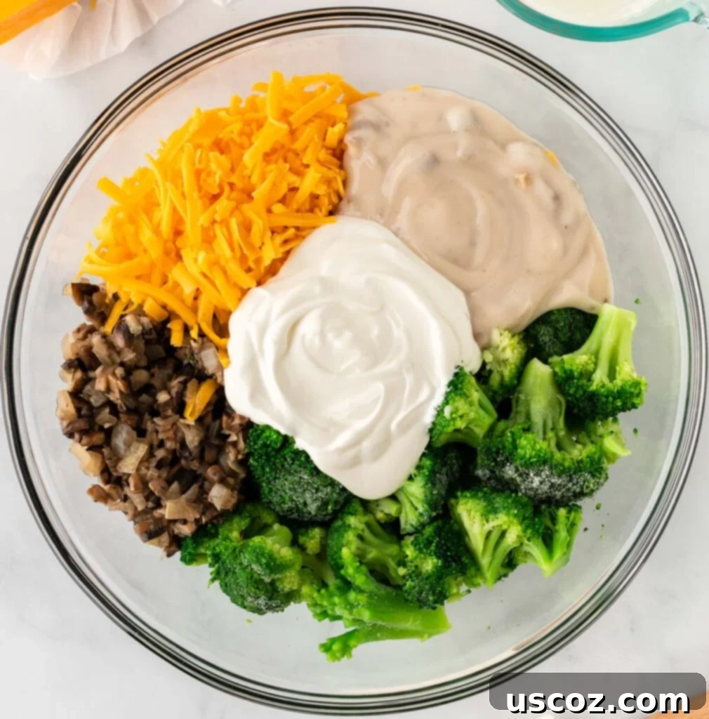 Crispy Ritz Broccoli Bake 7 broccoli casserole ingredients in a mixing bowl
