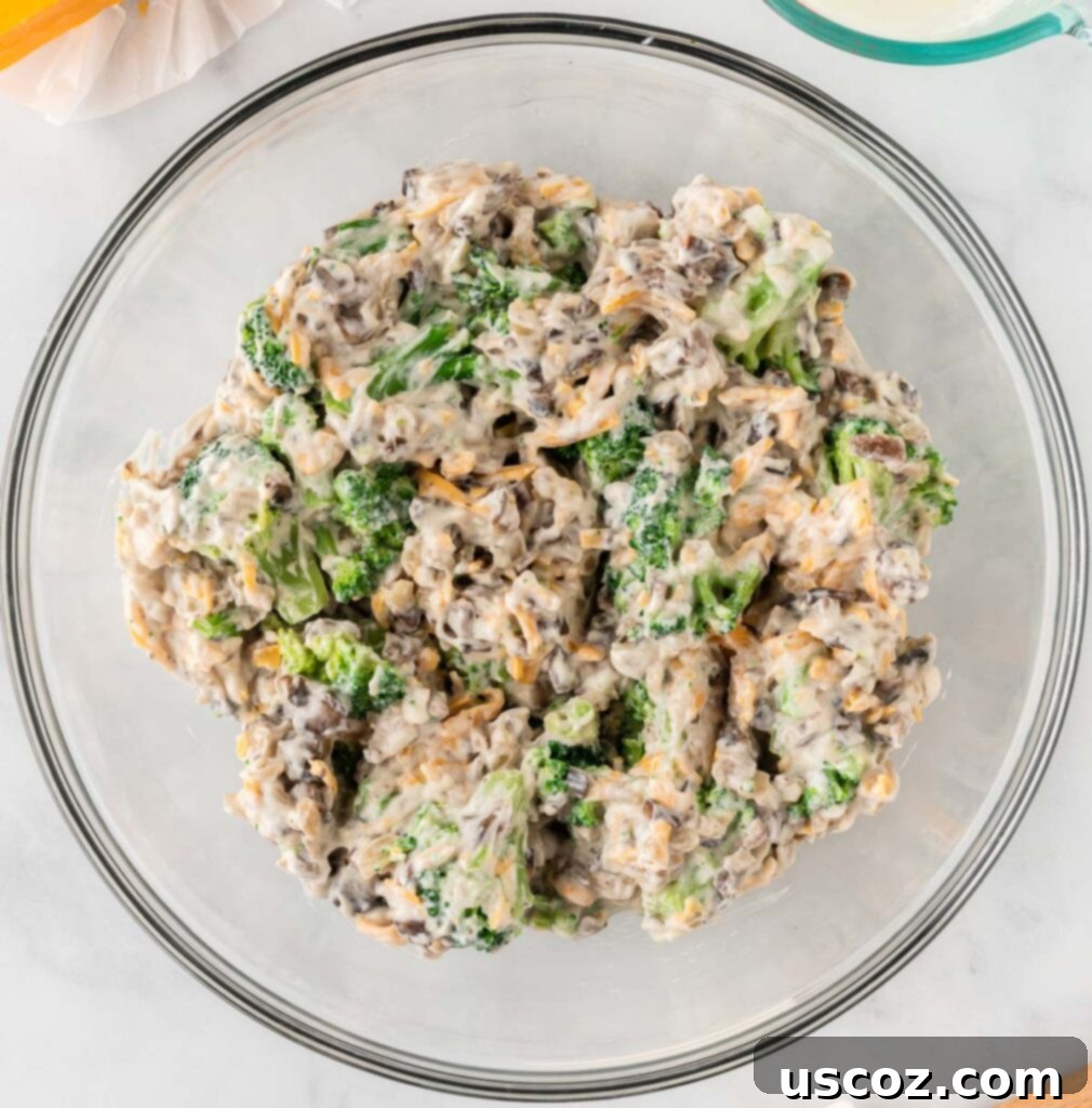 Crispy Ritz Broccoli Bake 8 broccoli casserole ingredients in a mixing bowl mixed together