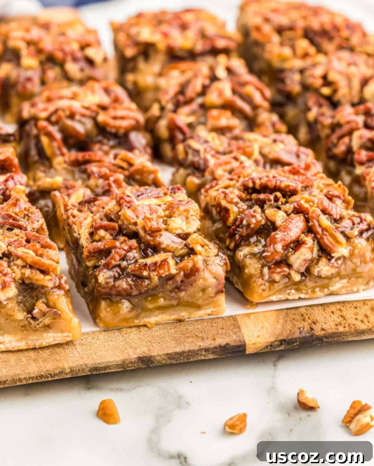 Decadent Pecan Pie Bars 2 homemade pecan pie bars with shortbread crust