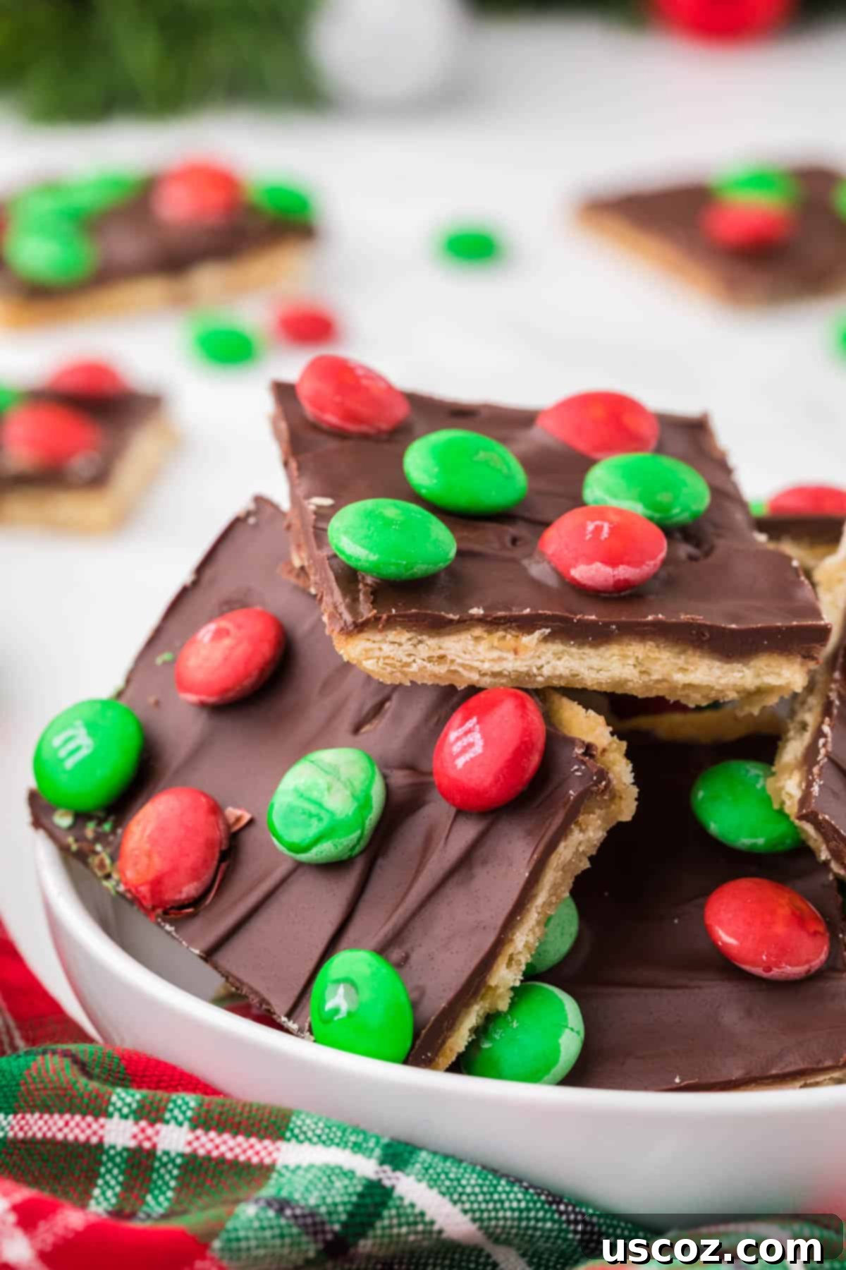 Christmas Cracker Toffee Recipe 2 christmas crack pieces in a bowl