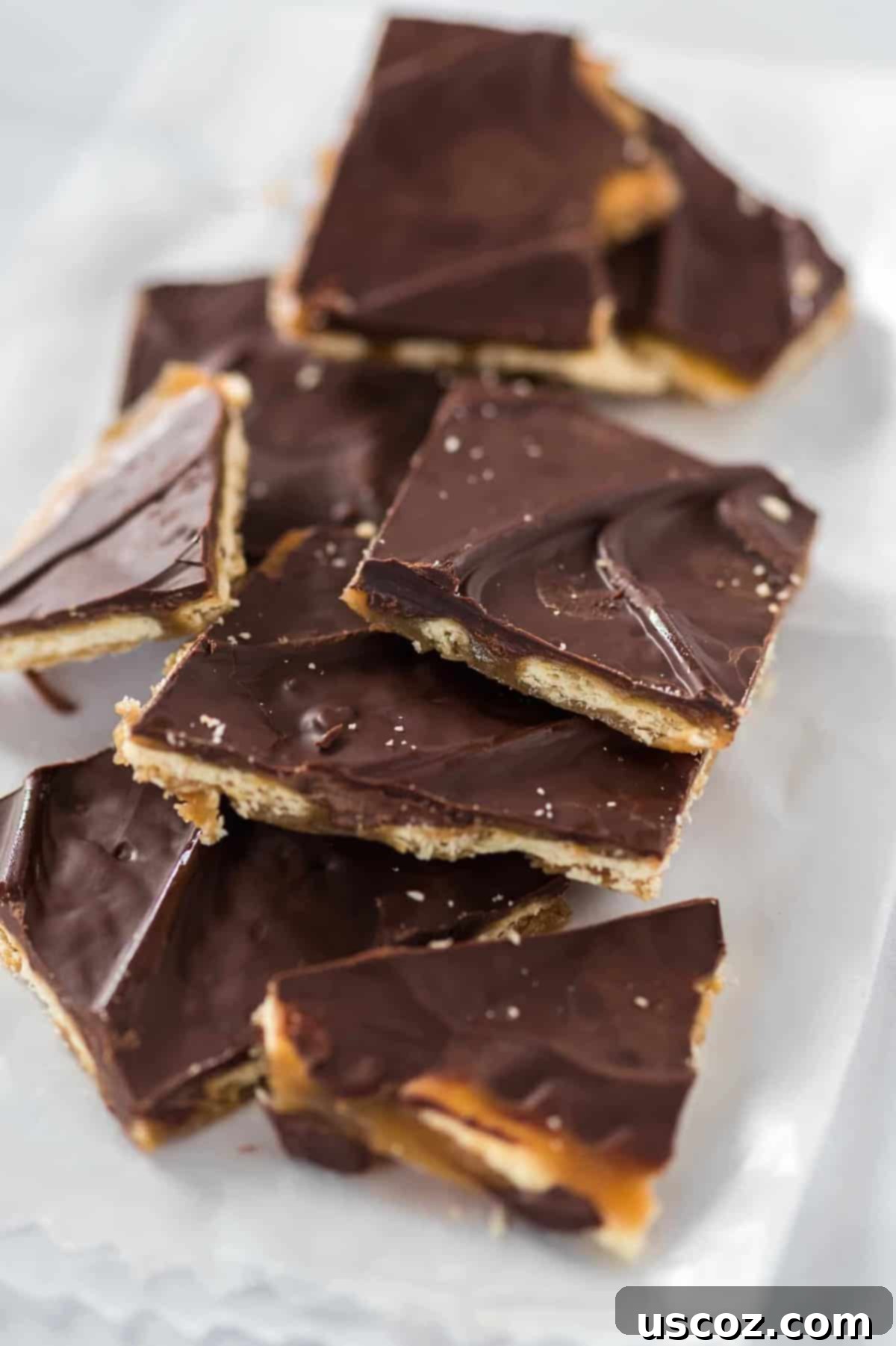 Christmas Cracker Toffee Recipe 3 stacked saltine candy without toppings