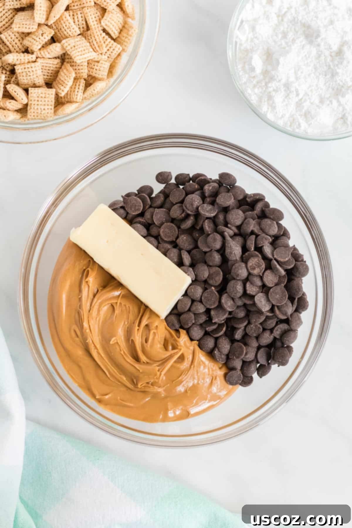 Plant Based Powdered Perfection 4 peanut butter, vegan butter, and chocolate chips in a bowl