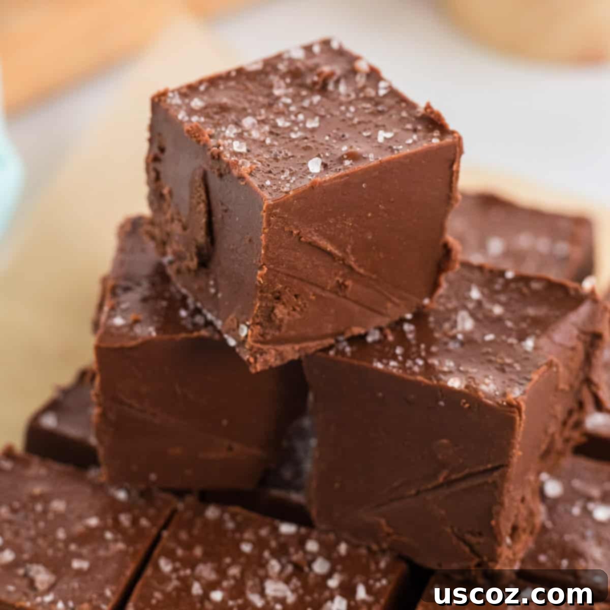Decadent Vegan Chocolate Peanut Butter Fudge 10 A large pile of freshly cut vegan chocolate peanut butter fudge pieces, ready to be served or stored.