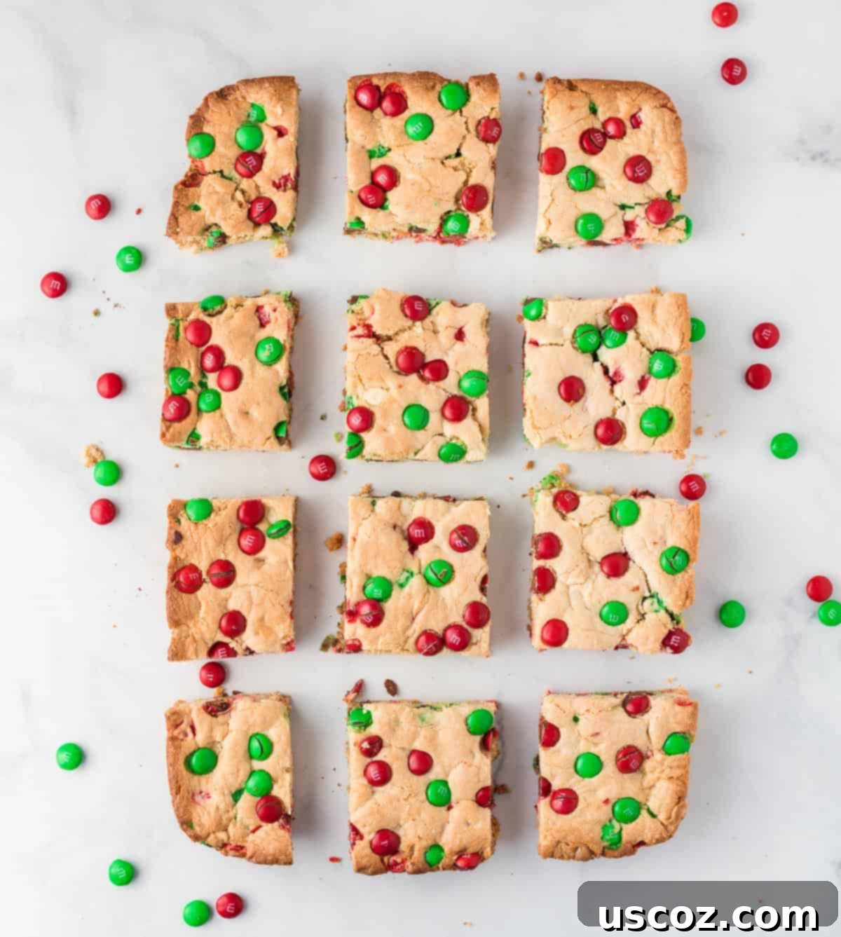 Merry Cookie Bar Magic 13 Christmas cookie bars cut into 12 pieces arranged neatly on a plate