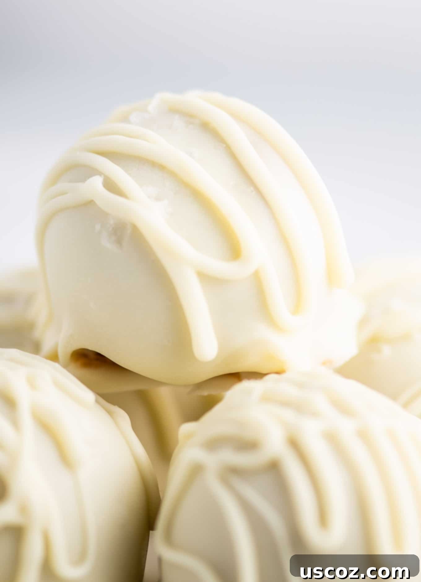 Decadent White Chocolate Peanut Butter Bliss Balls 7 white chocolate truffles close up image
