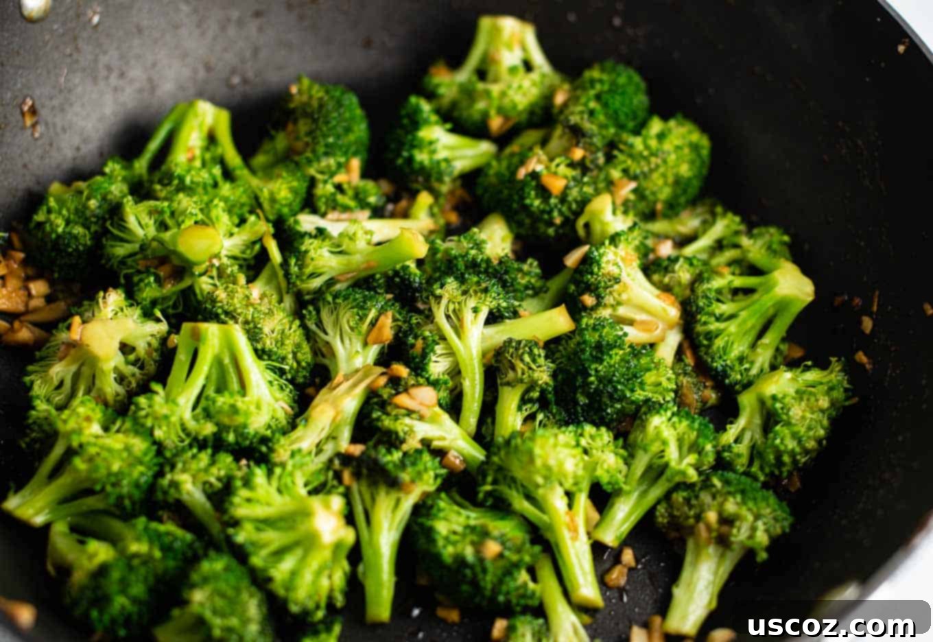 Easy Broccoli Stir Fry 10 broccoli florets cooked in a black wok