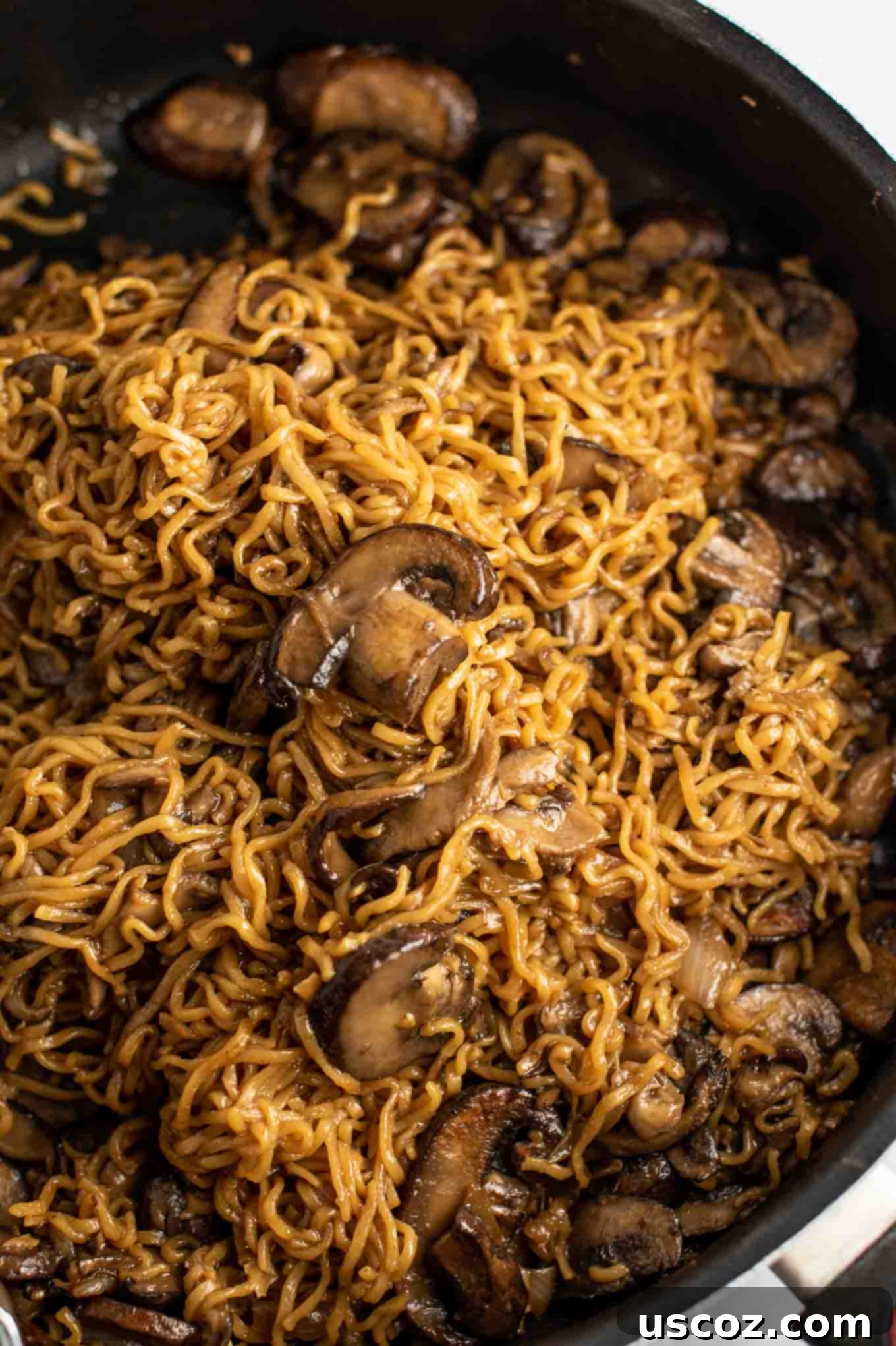 Umami Mushroom Ramen 13 An overhead view of easy ramen stir fry with mushrooms in the pan, showcasing its rich texture and color.