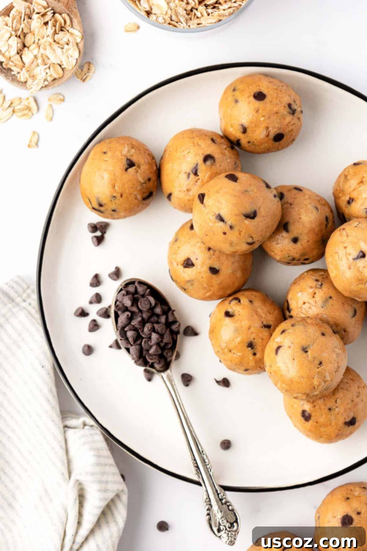 Wholesome Energy Bites 10 A pile of perfectly round no-bake protein balls, showcasing their wholesome ingredients and inviting texture