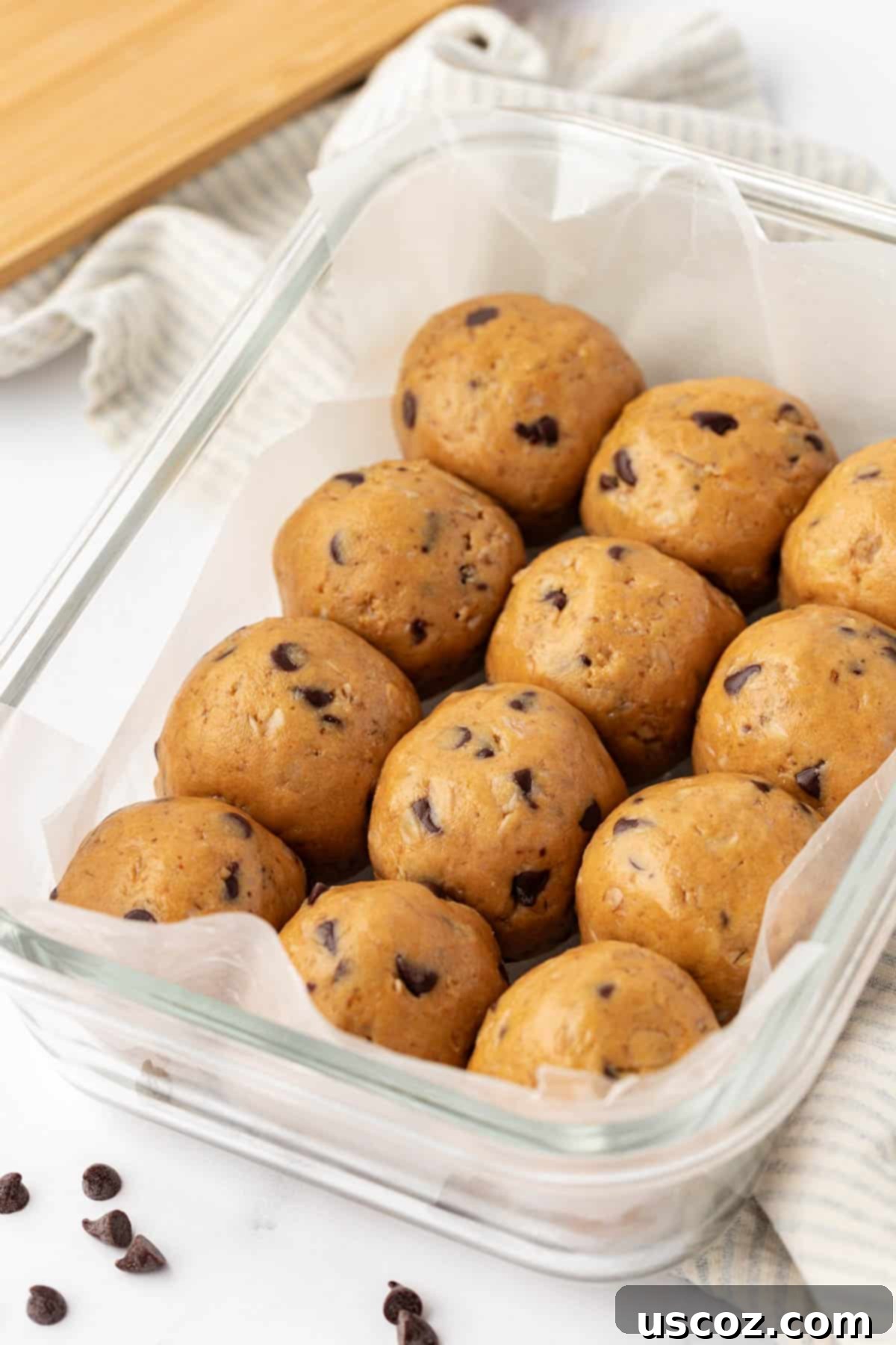 Wholesome Energy Bites 12 More no-bake protein balls stacked in a rustic bowl, emphasizing their appetizing and wholesome nature