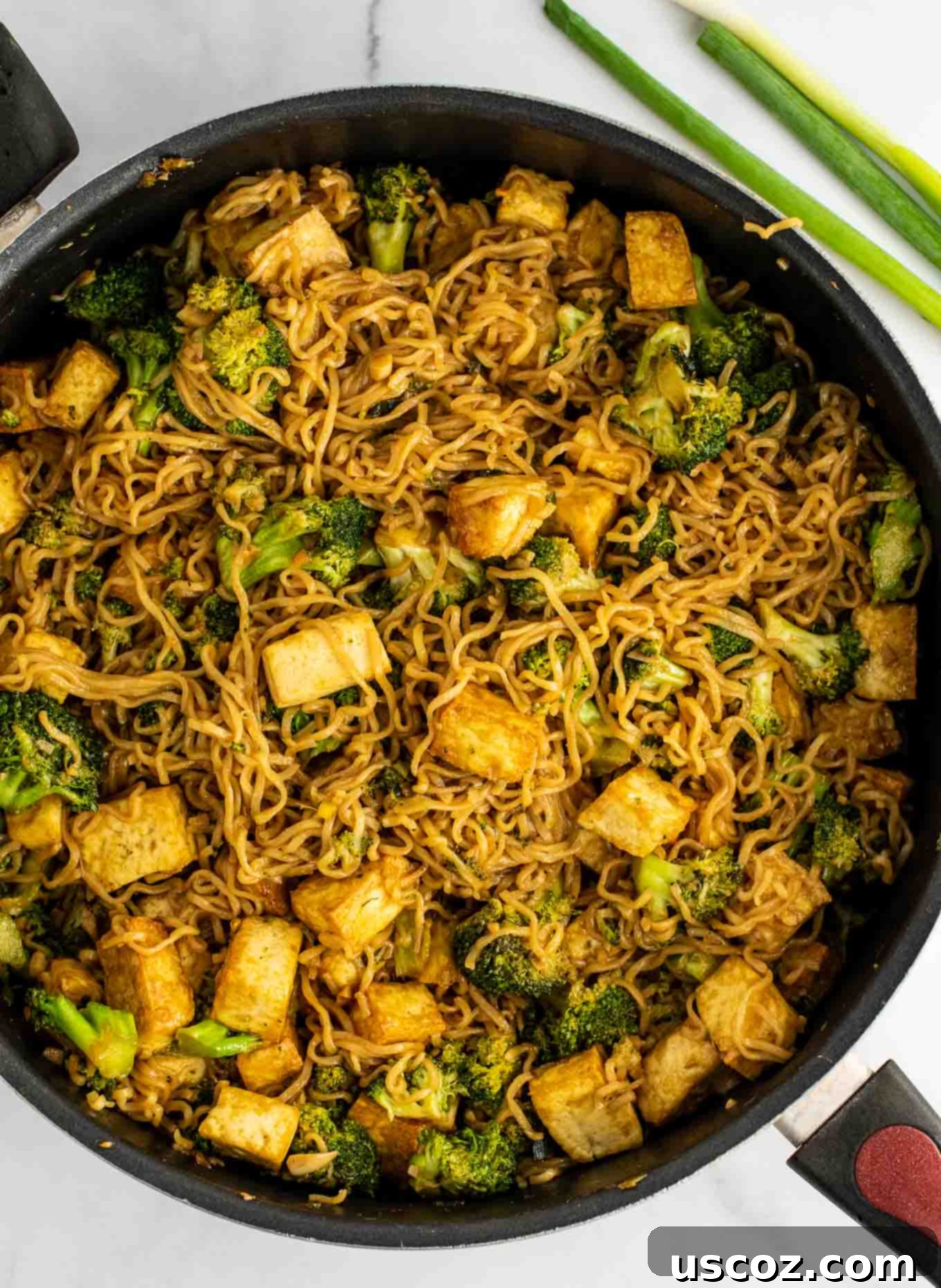Savory Broccoli Tofu Ramen 7 ramen noodles in a skillet with tofu and broccoli