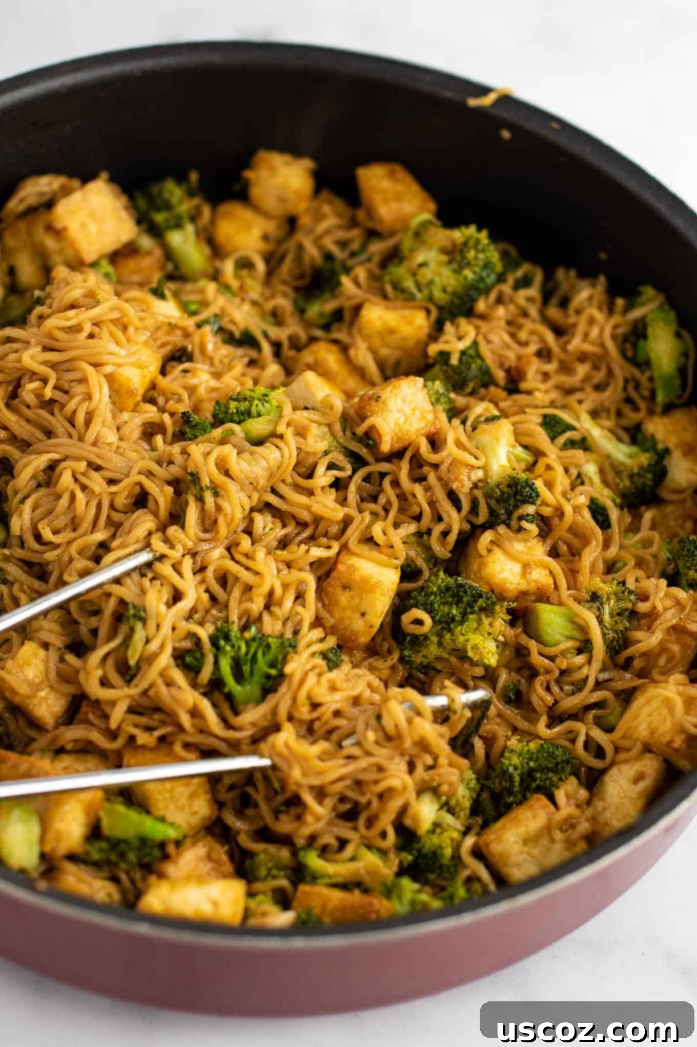 Savory Broccoli Tofu Ramen 9 ramen noodle broccoli tofu stir fry in a pan from a side view