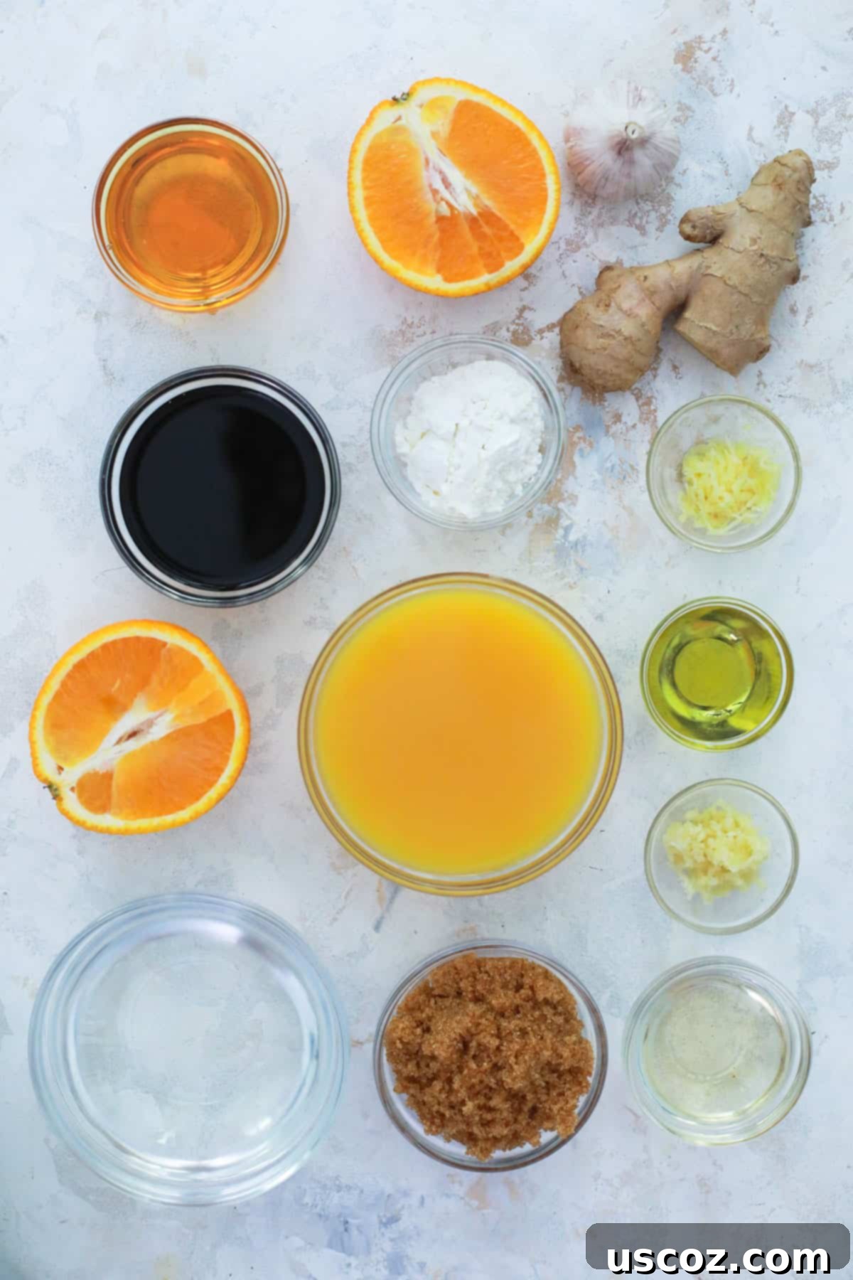 Zesty Orange Sauce 5 ingredients for orange sauce in glass bowls